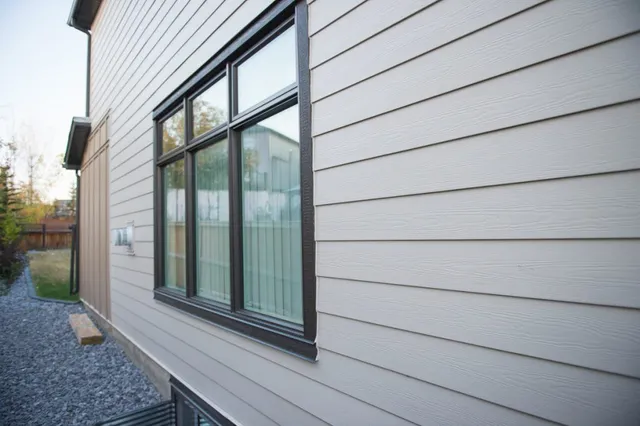 hardie-fiber-cement-lap-siding-closeup-window-trim-calgary
