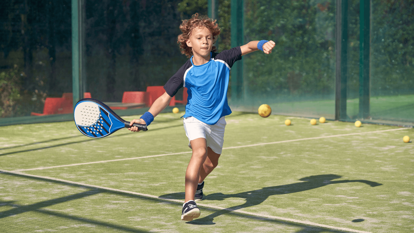 Kid with a padel racket