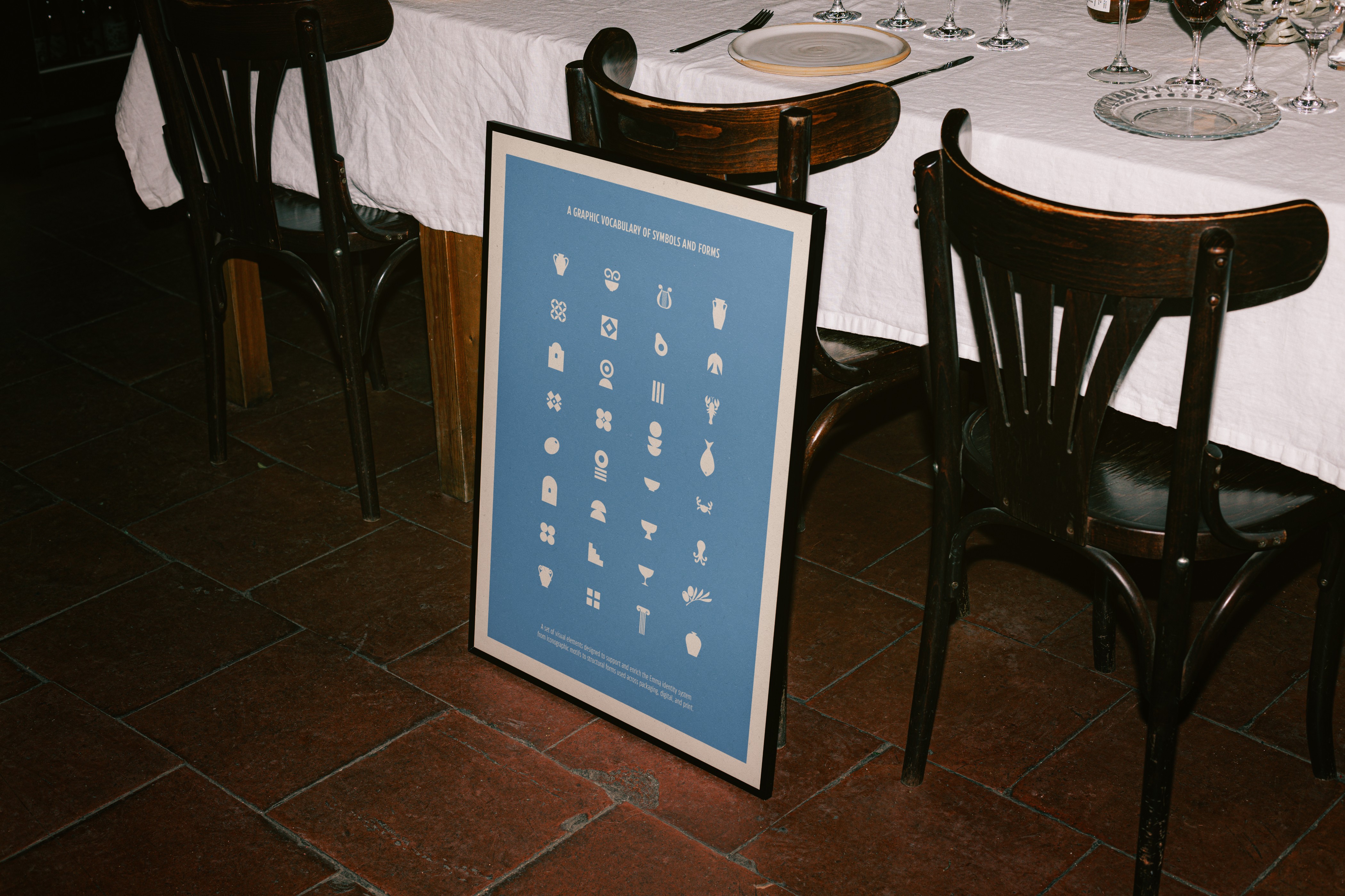 Streetside billboard with flyposters of the Batch.Works brand and illustrations