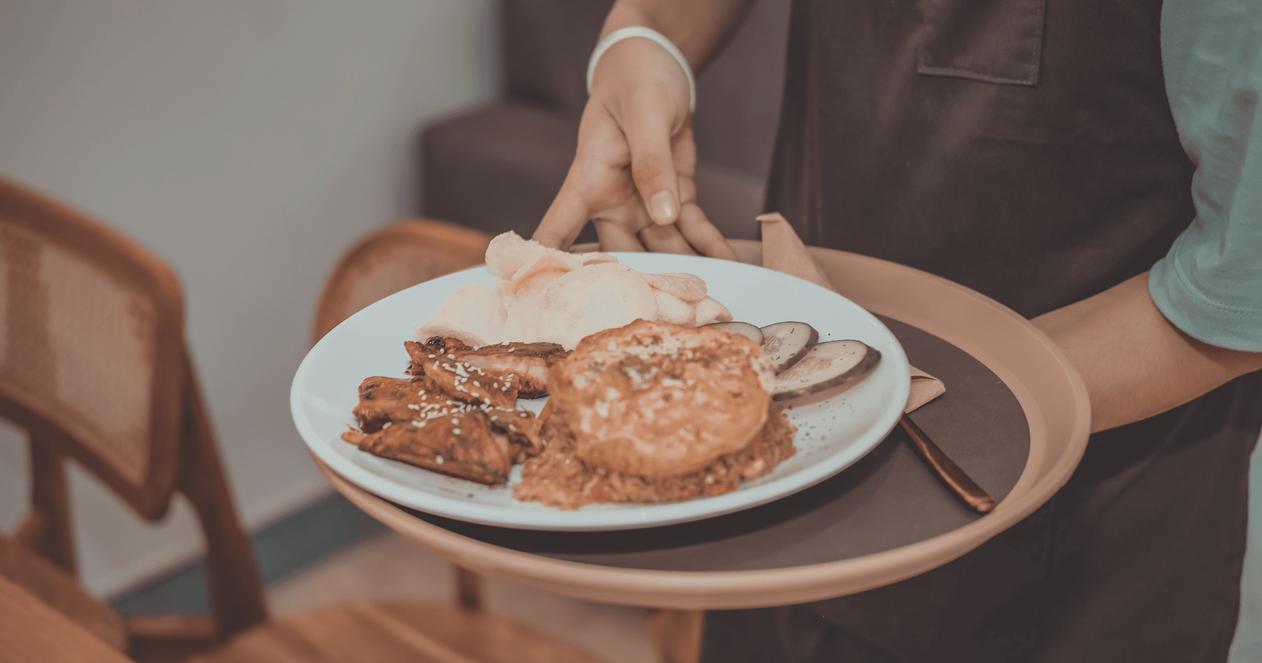Cafe staff serving food