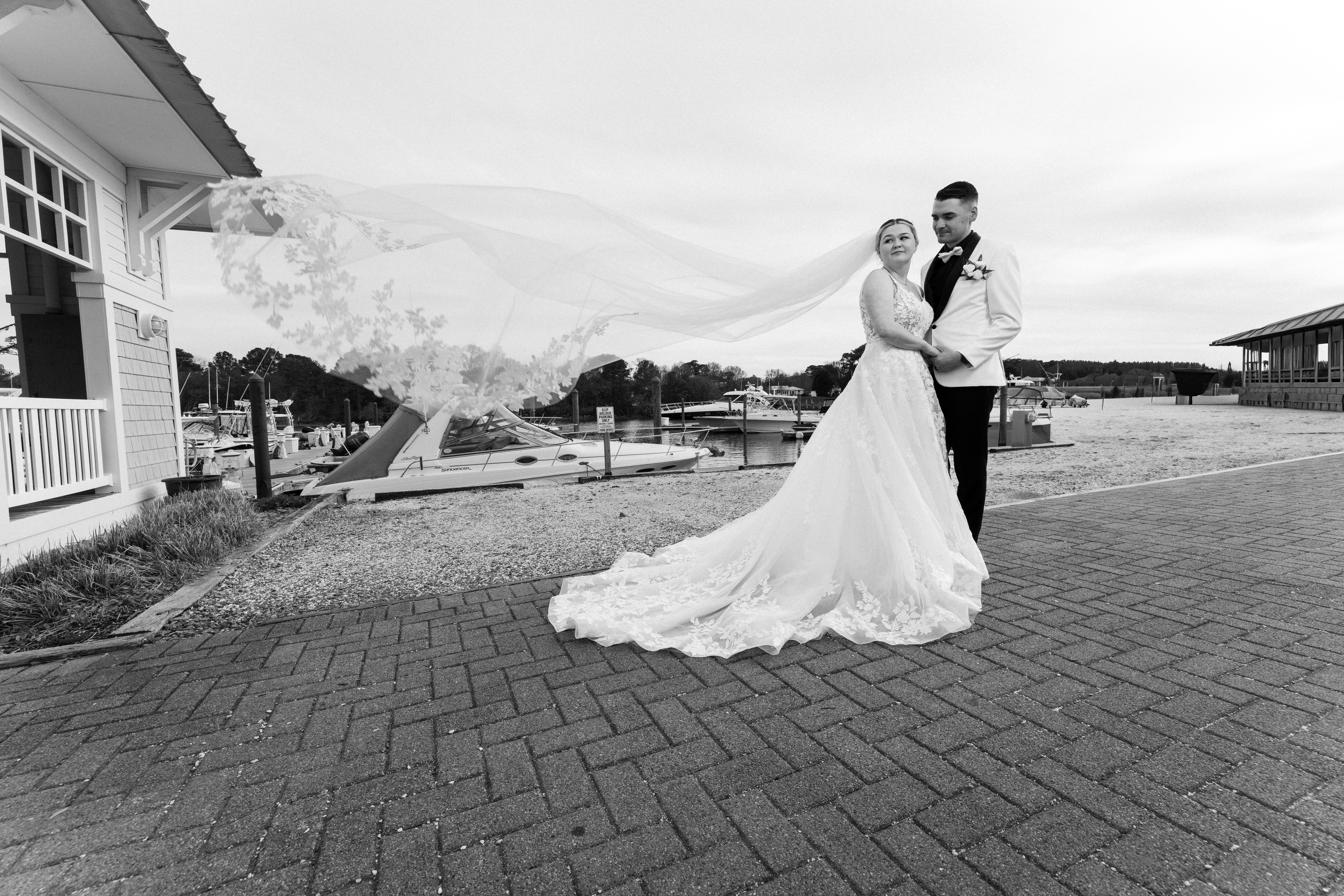 A bride in an elegant white gown.