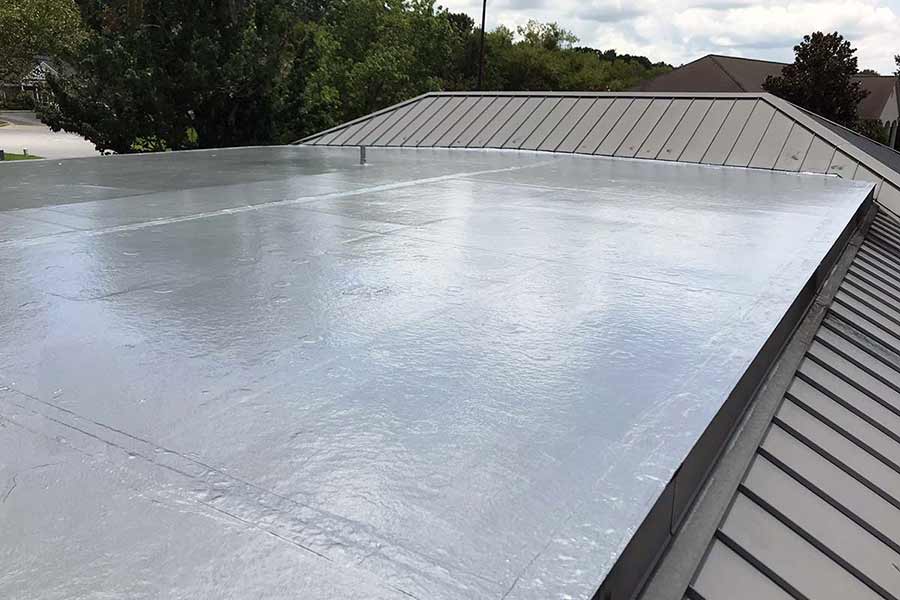 Residential flat roof coating to protect from the weather and future leaks. 