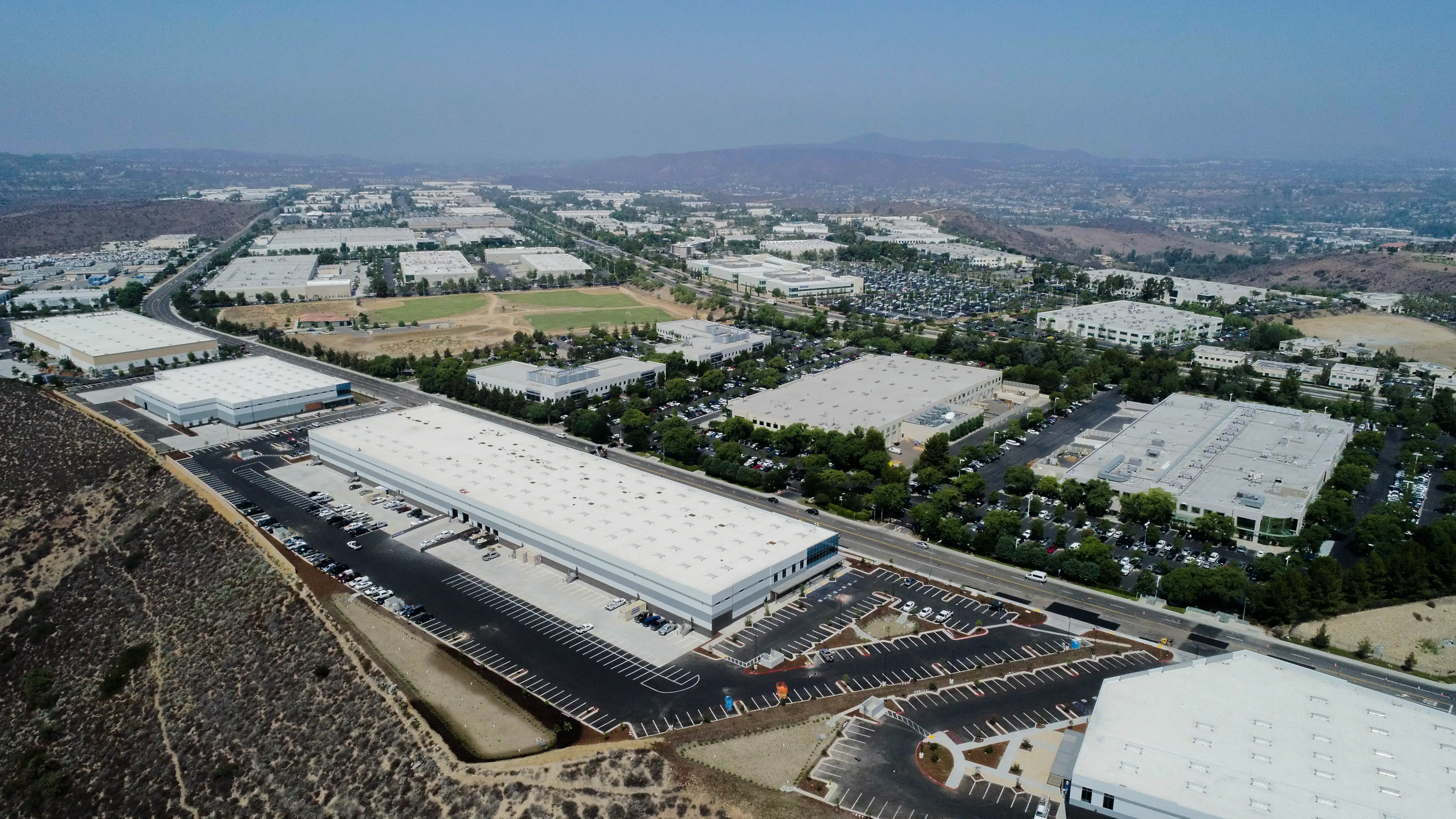 aerial drone photo of commercial building parking lot project