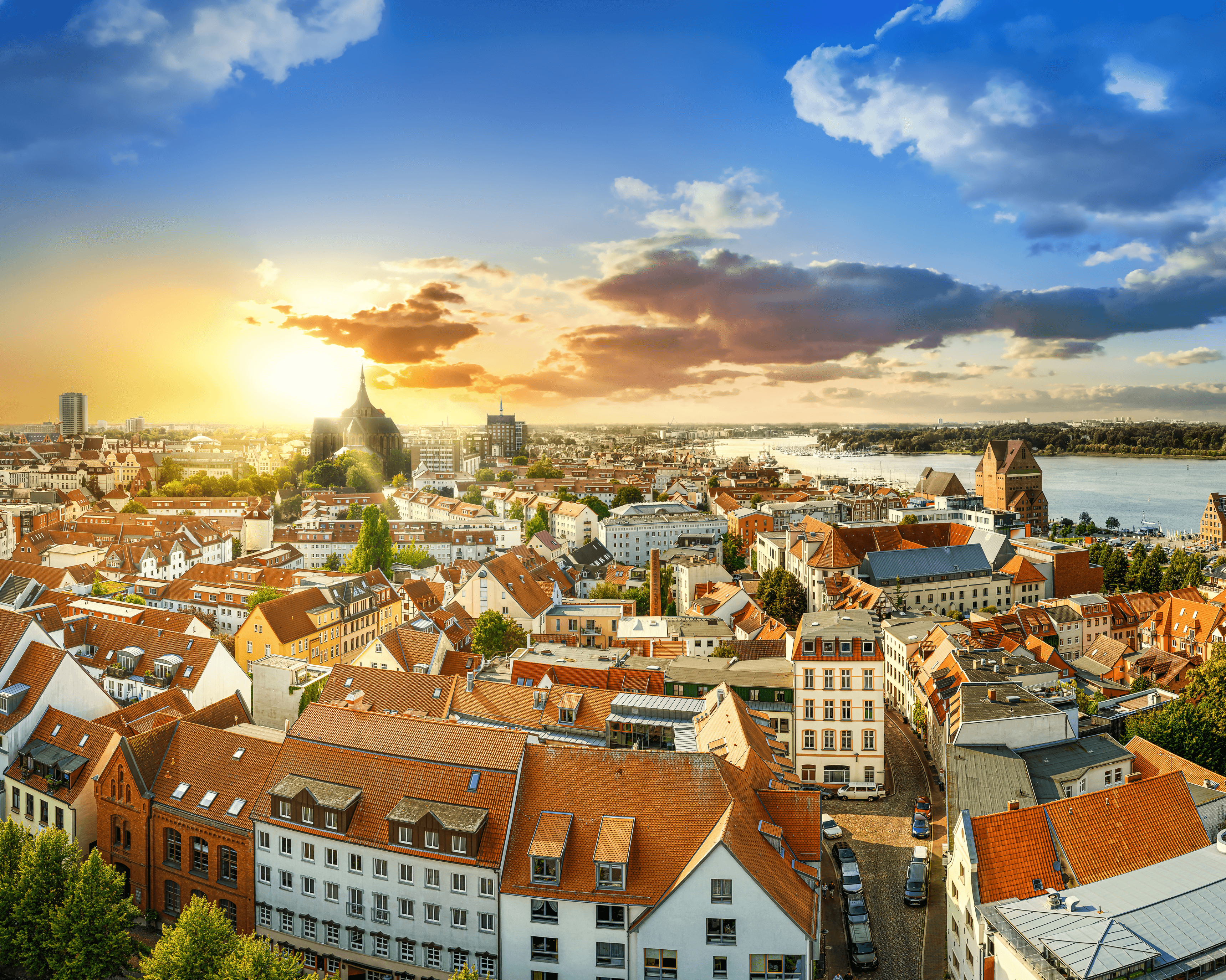 kids lying on a glass land and smiling