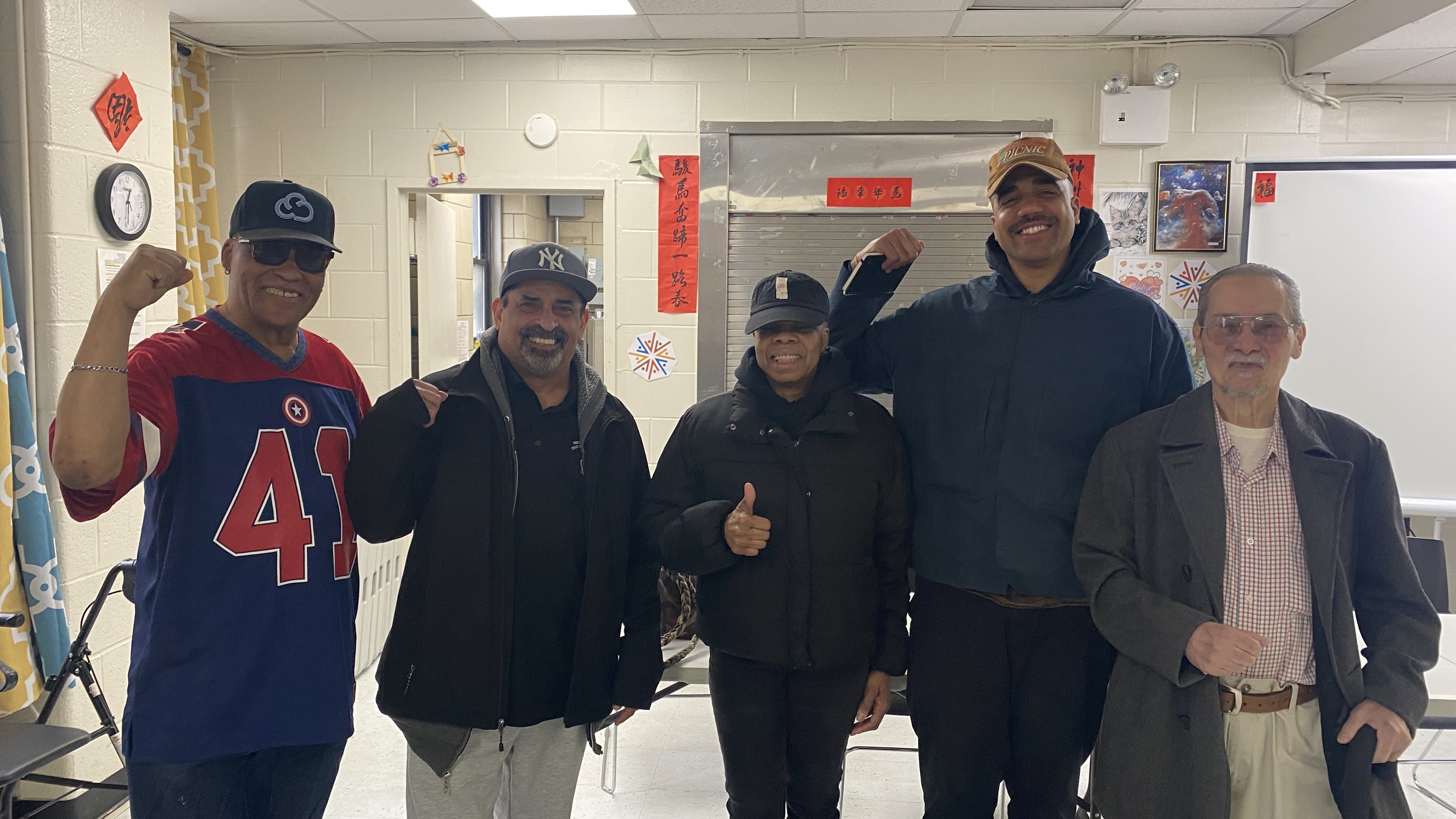 Baruch tenants smile together after a successful meeting.