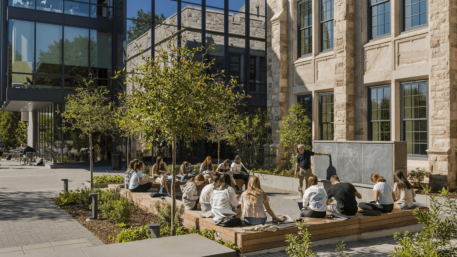 Outdoor university class near chalkboard - best colleges outdoor education