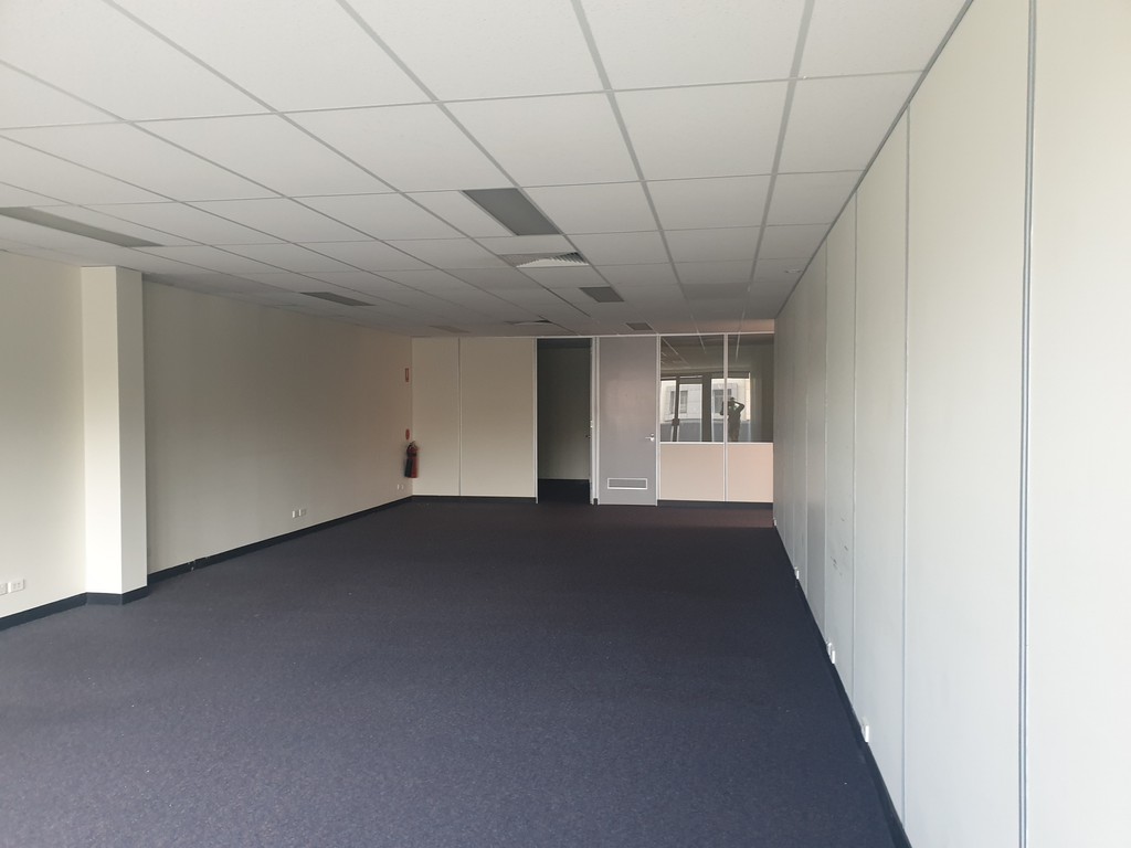 Professional interior painting in a spacious Melbourne office, completed by Alicon Painting.