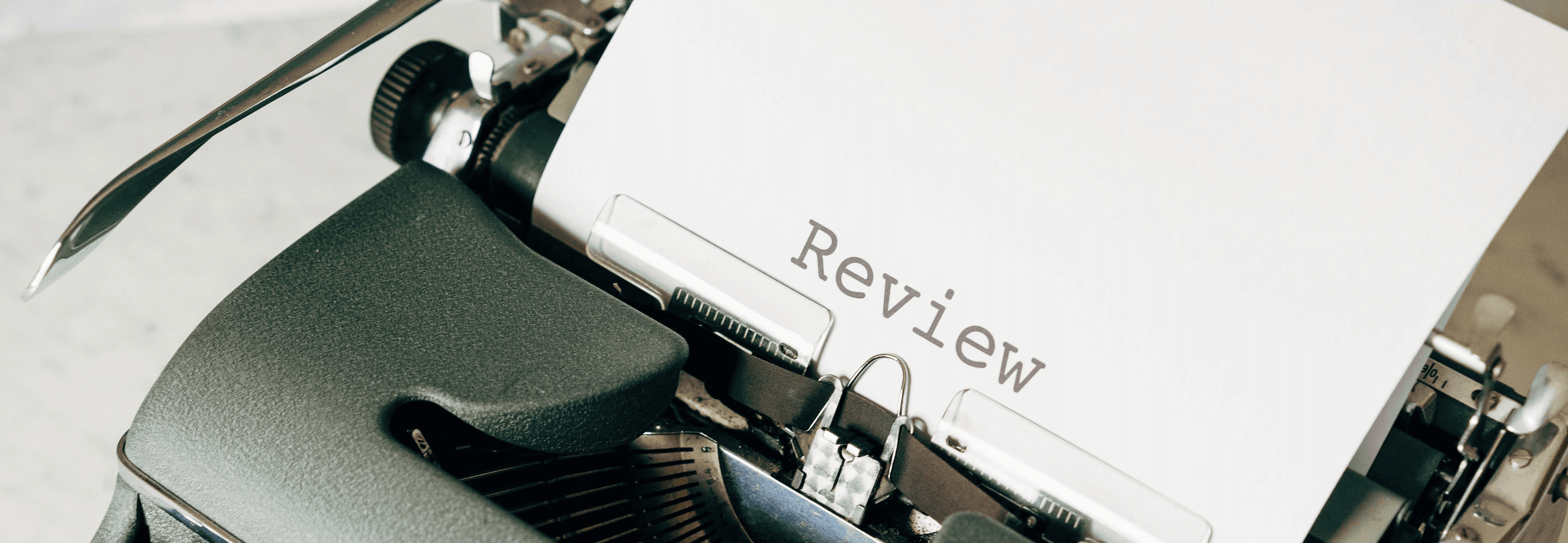 black and white typewriter on white table