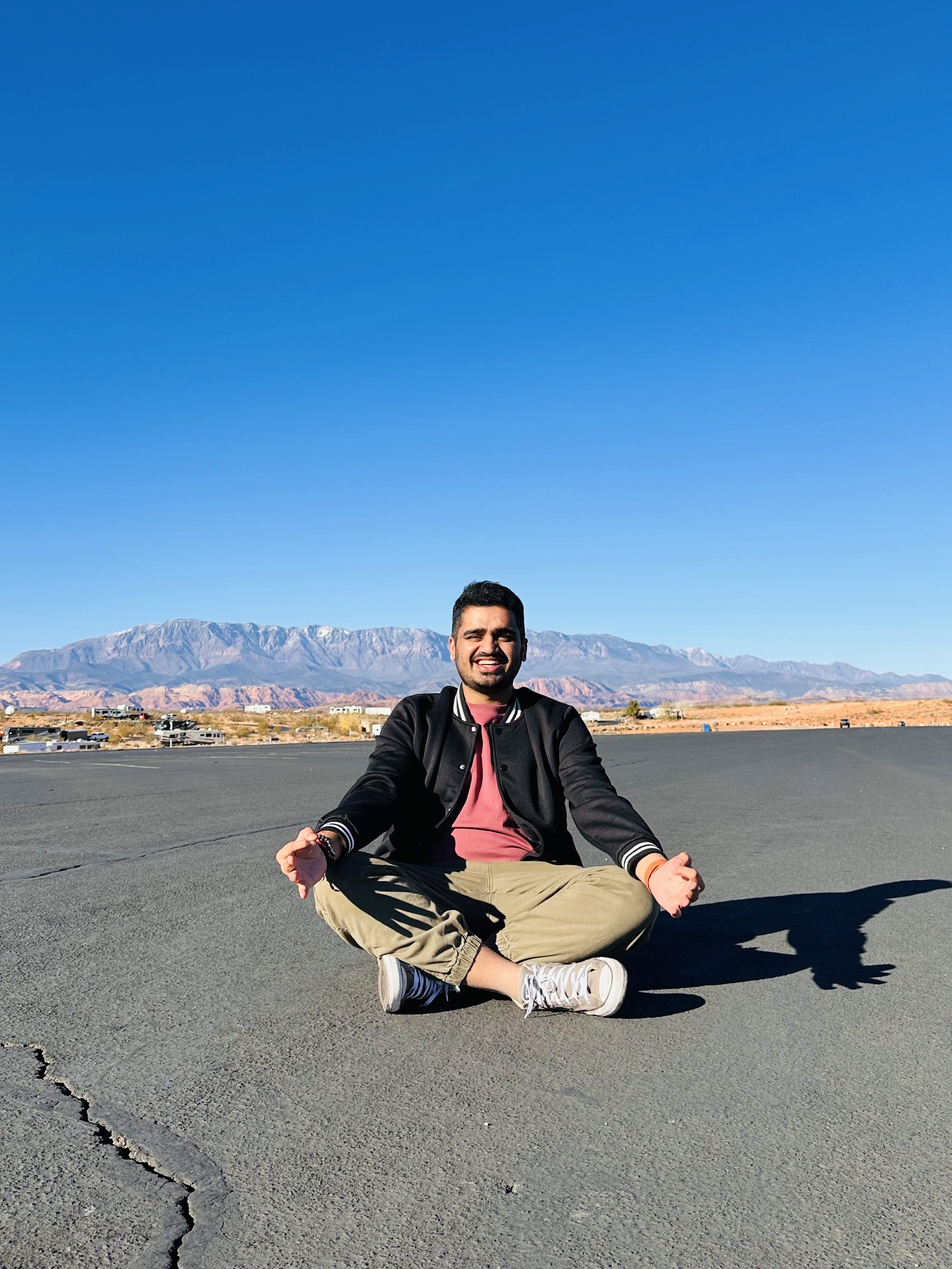 Profile portrait of a man in a grey shirt