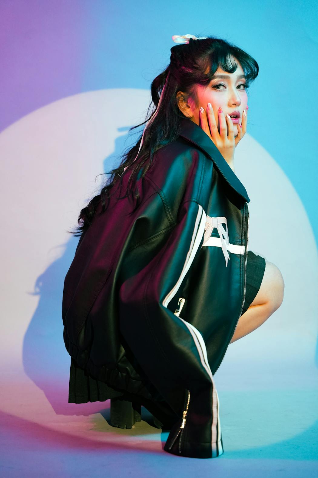 Stylish portrait of woman in leather jacket