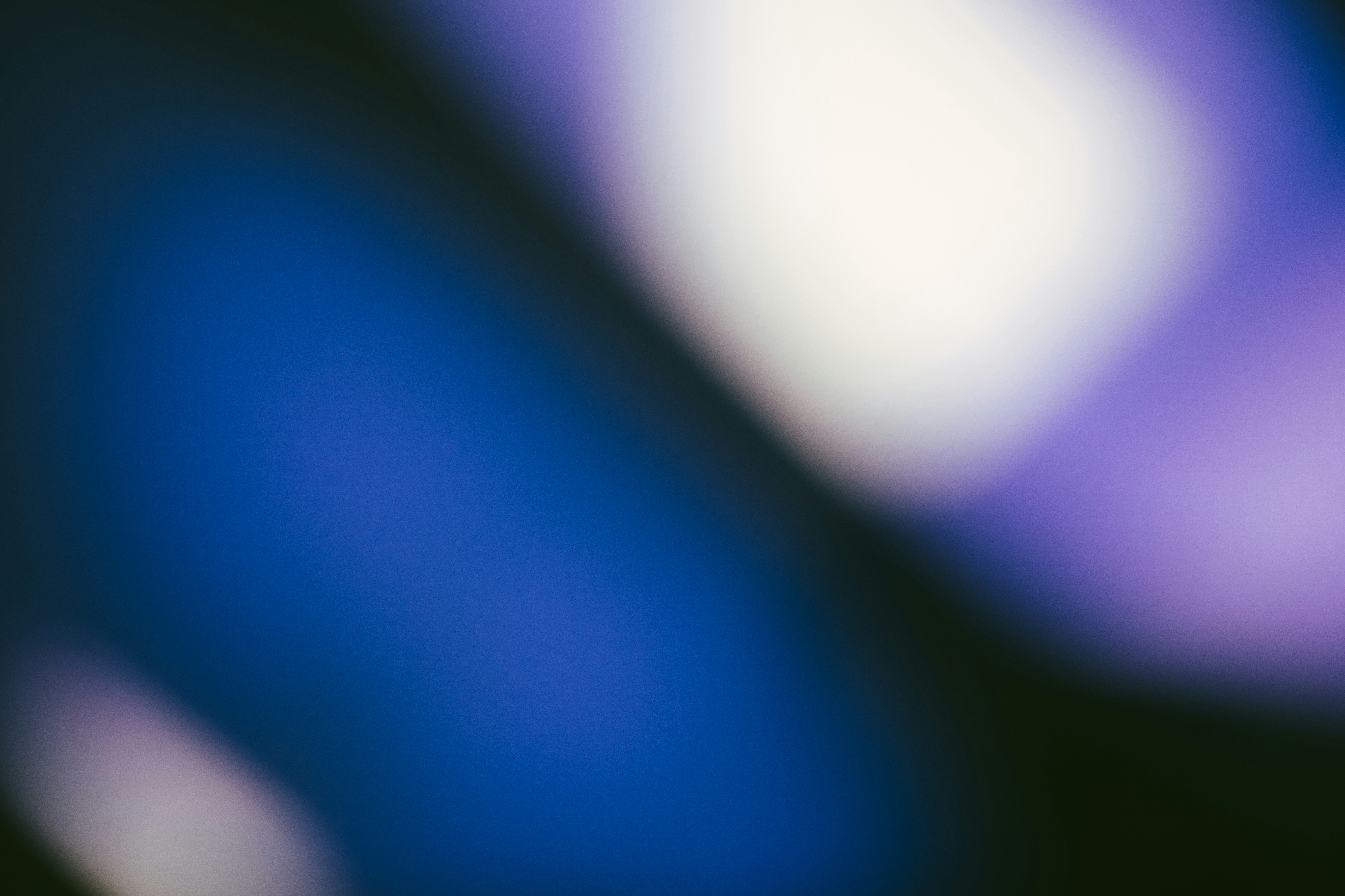 Abstract blue and white light streaks
