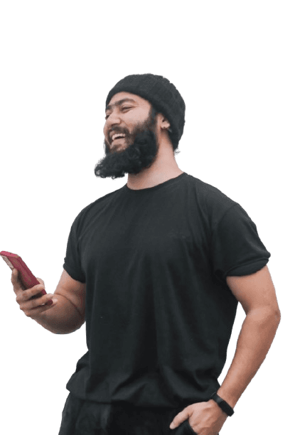 a man with a beard holding a cell phone