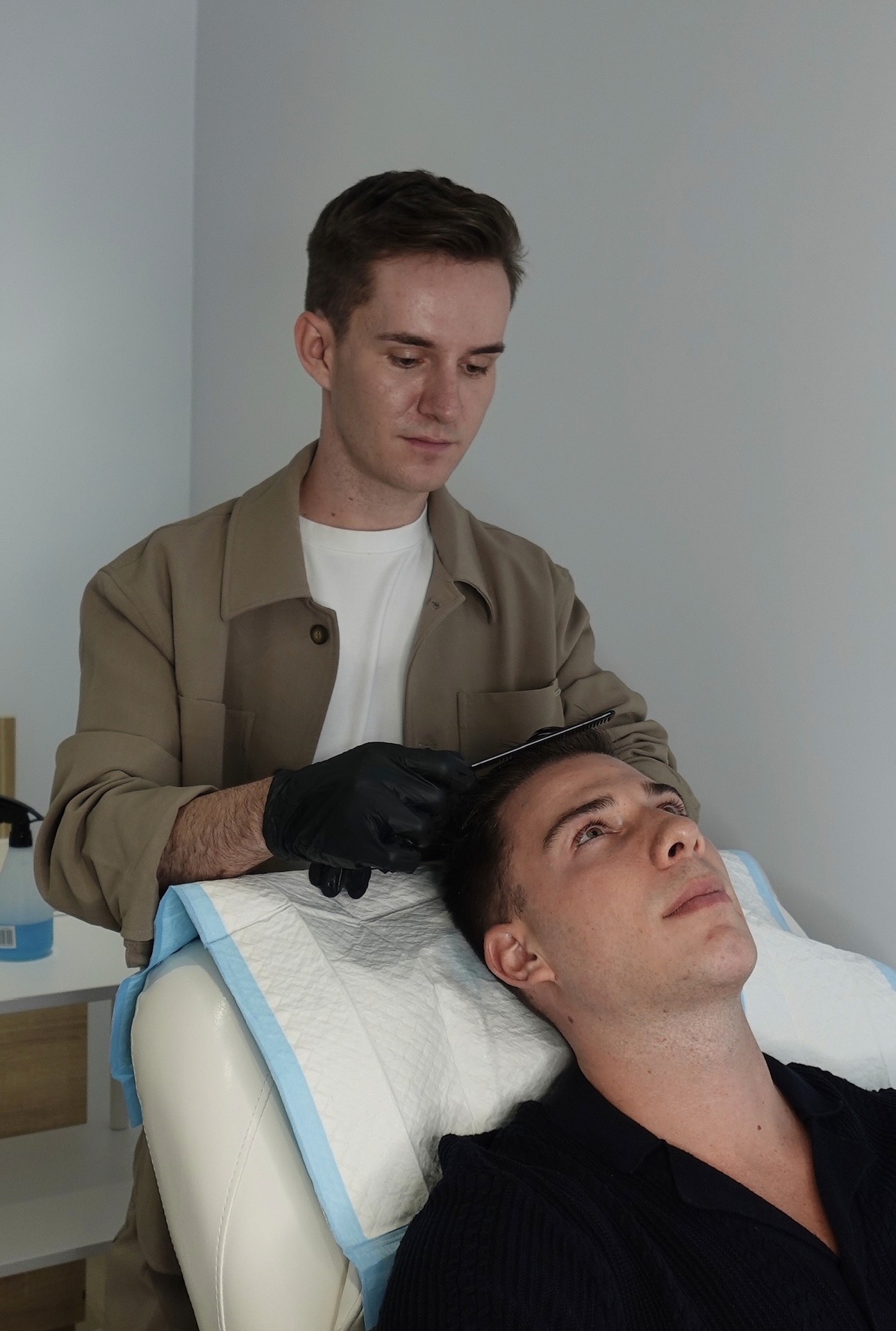 Man meditating in seated yoga pose with eyes closed