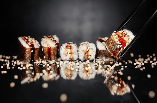Sketch of a gray orange conceptcar on a white desk