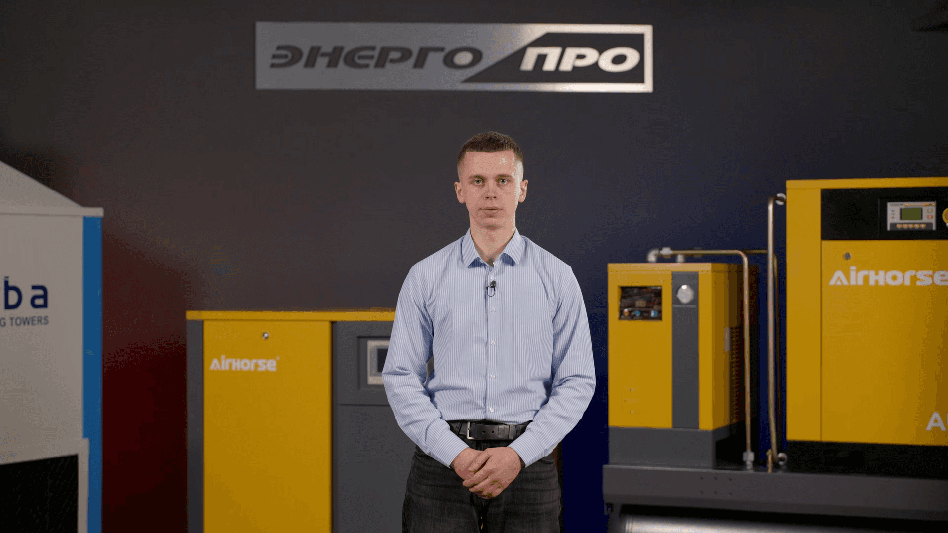 A man standing in front of heating equipment