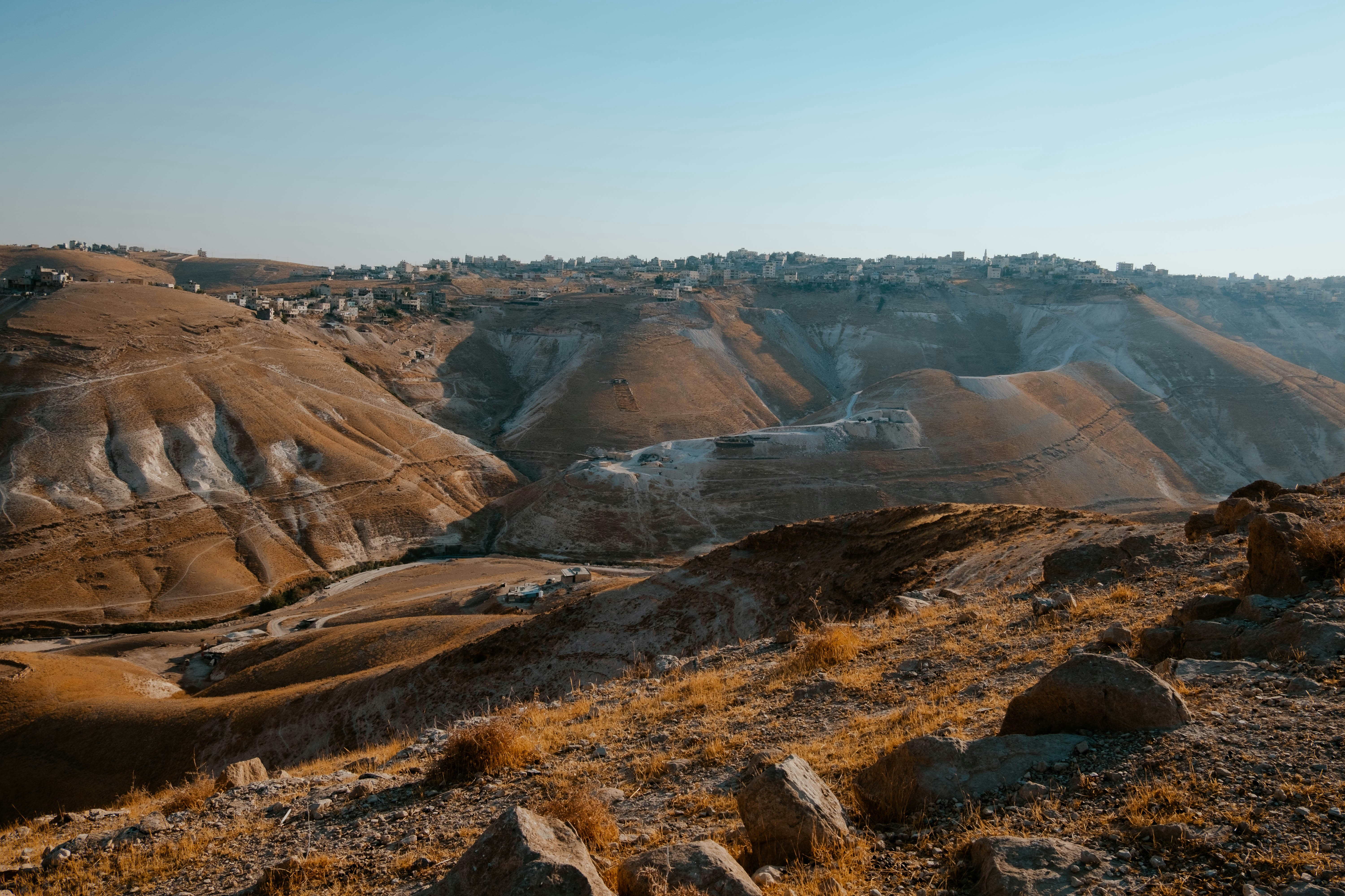 brown and gray mountains under blue sky during daytime