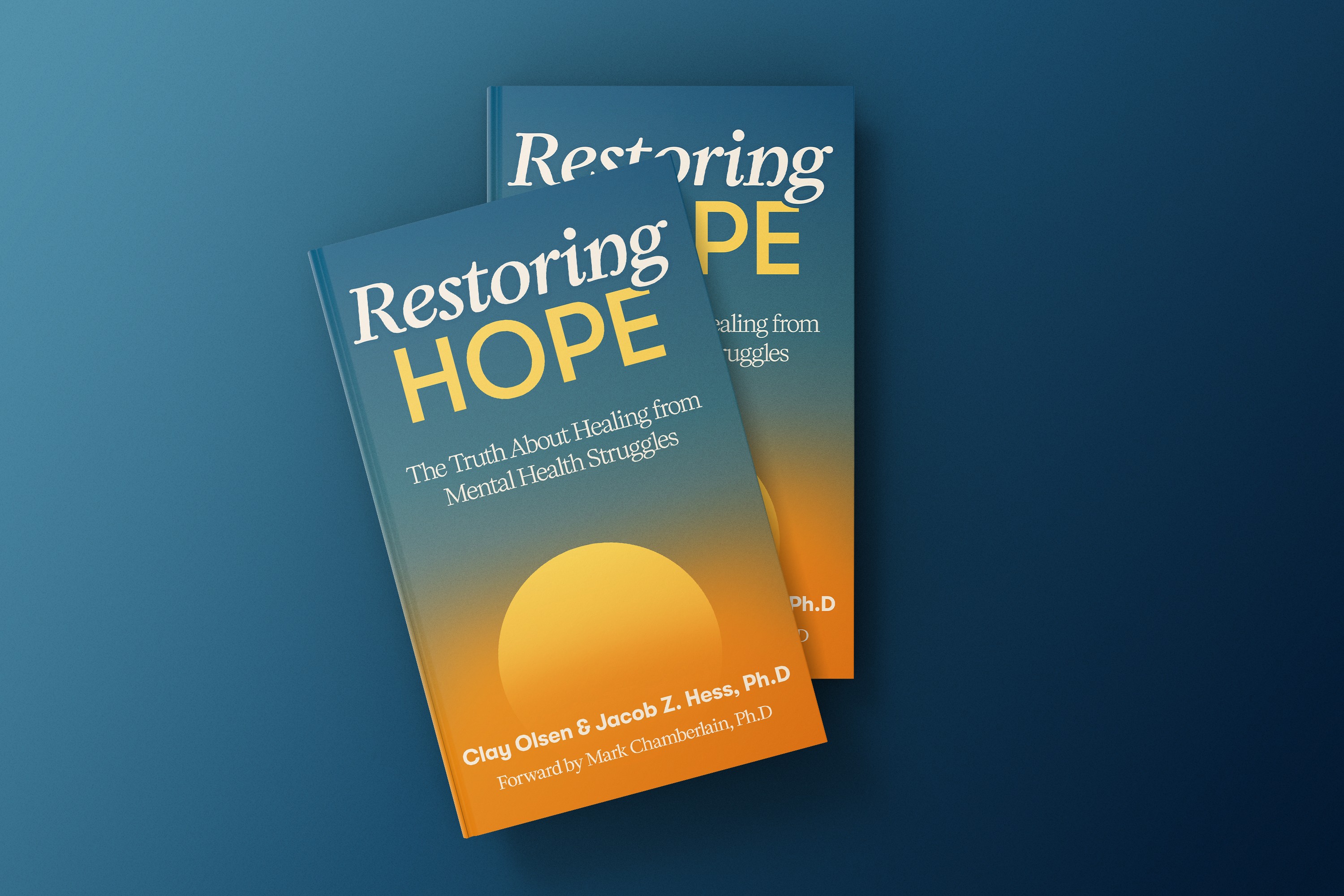 An image of a book written by Clay Olsen and Dr. Jacob Hess, entitled "Restoring Hope". This book offers parents a research-backed alternative to discouraging narratives surrounding childhood mental health. Restoring Hope provides the compassionate, practical guidance every parent needs.