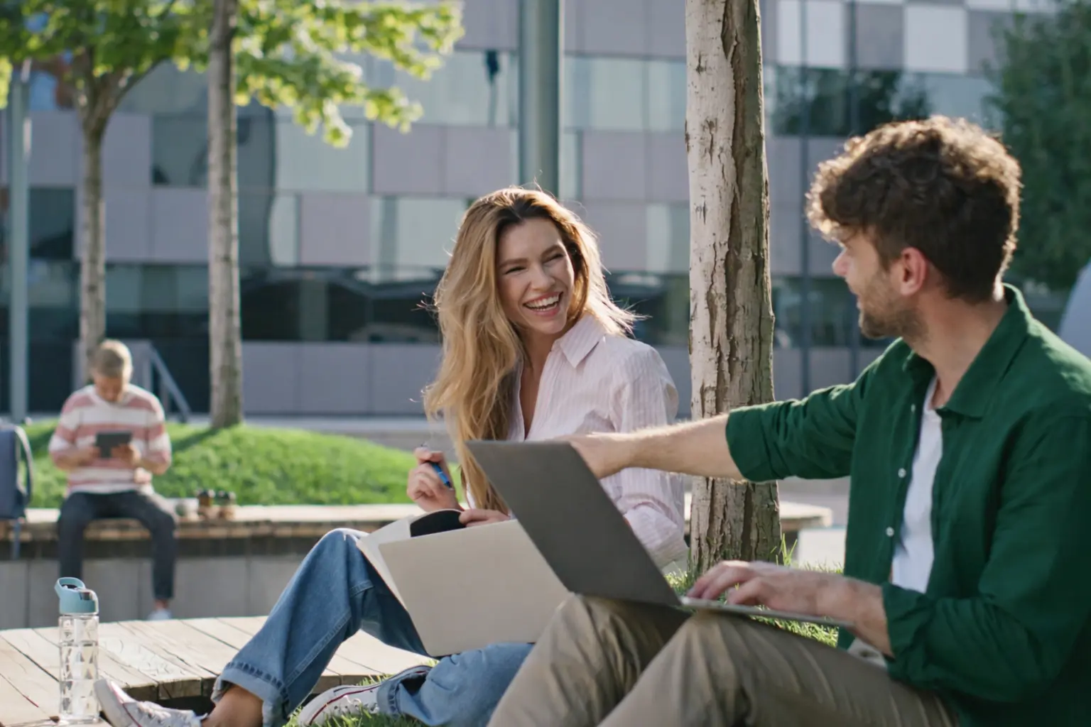 woman wearing gray long-sleeved shirt facing the sea