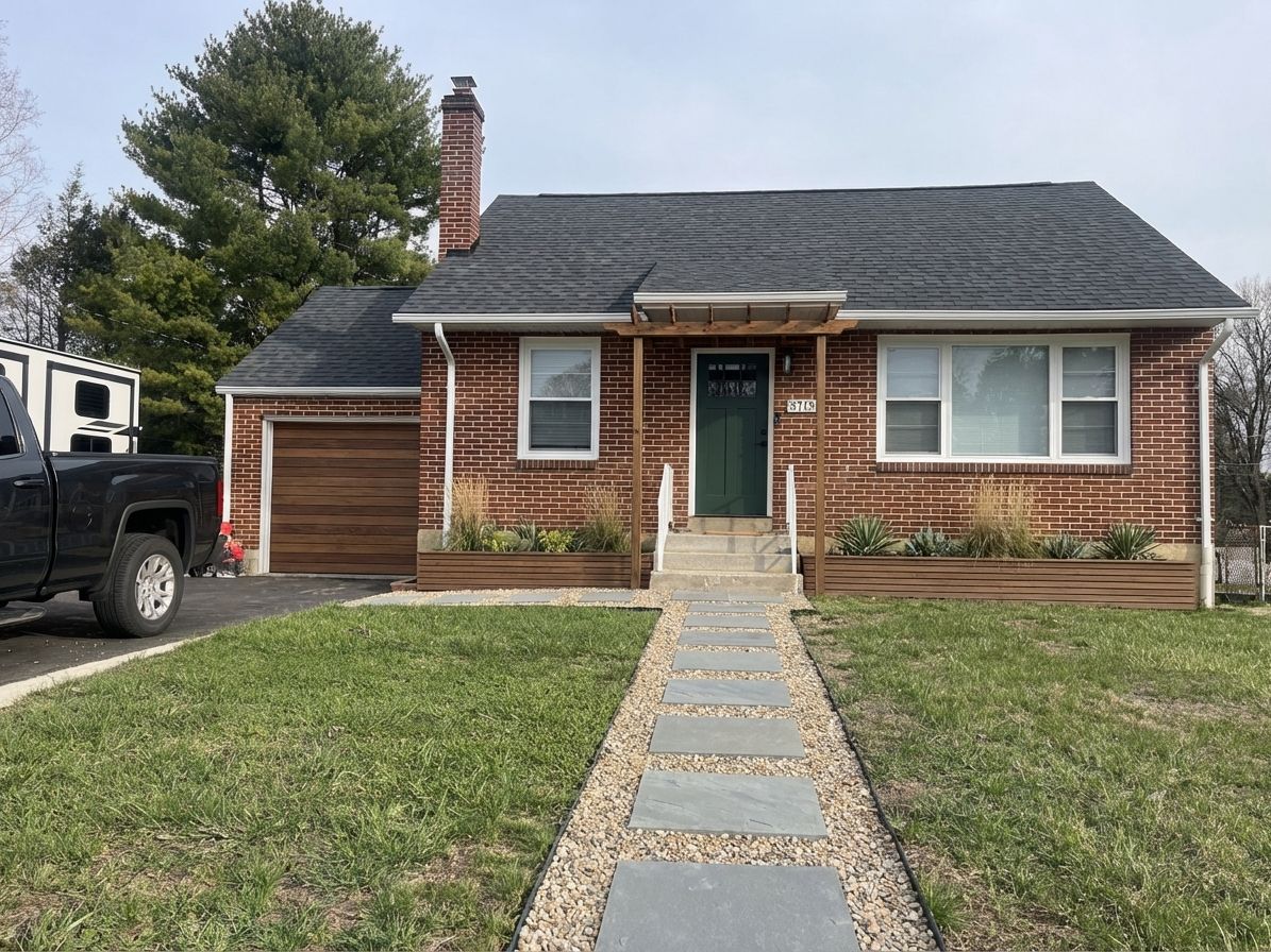 Mid-mod revival with wood garage door, green door, and geometric planters