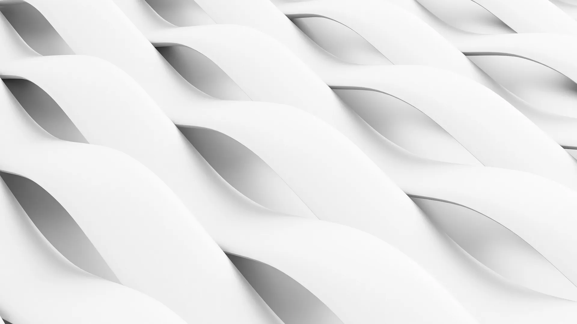 Striking modern skyscraper with a glass exterior, reflecting the cityscape and sky