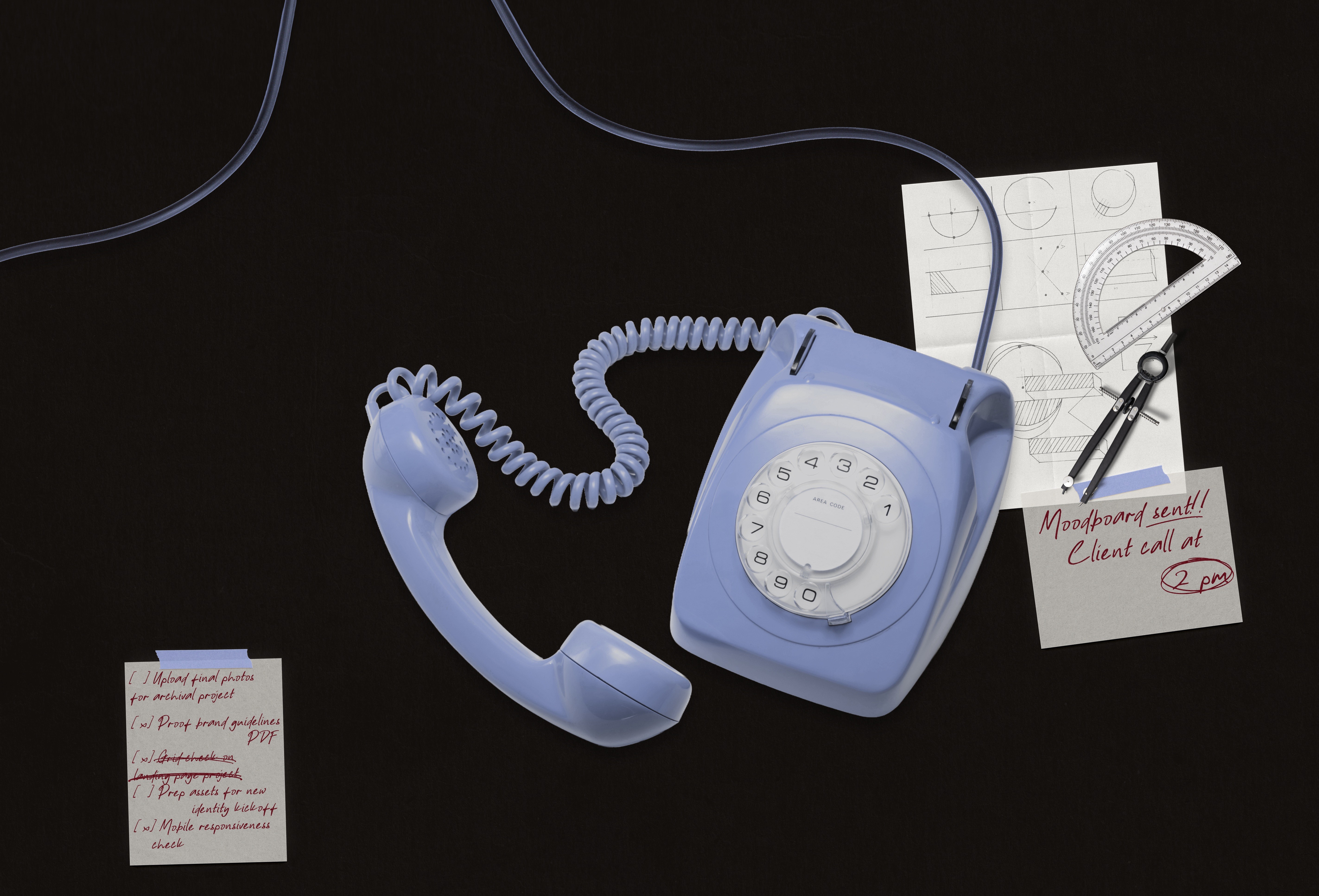 Vintage phone, paper notes.