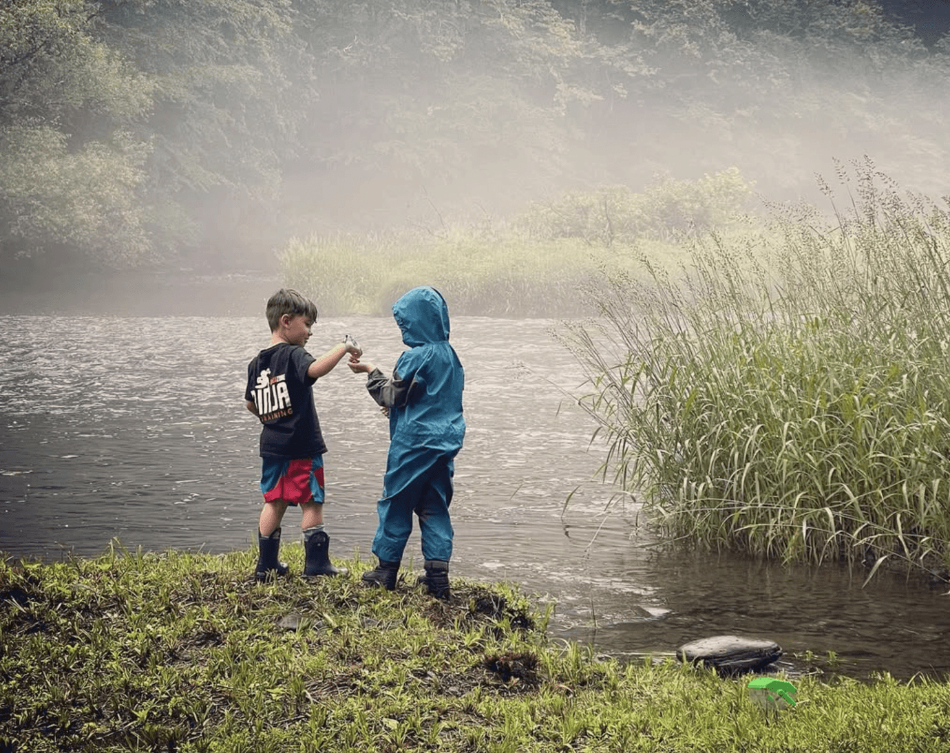 Boys by the river in early morning