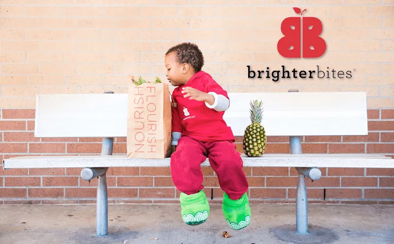 goofy puppy peeking through a paper hole 
