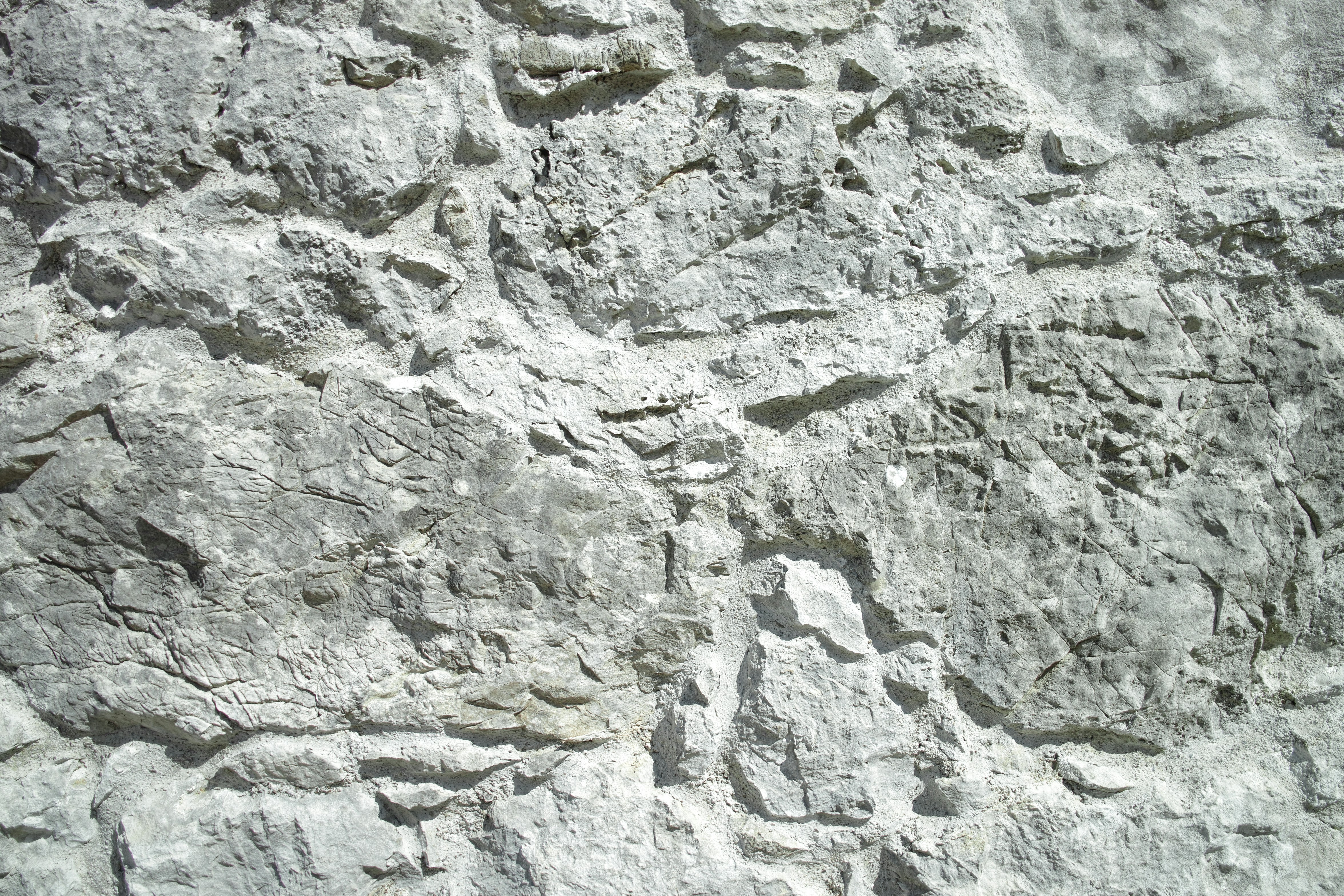 a close up of a wall made of rocks