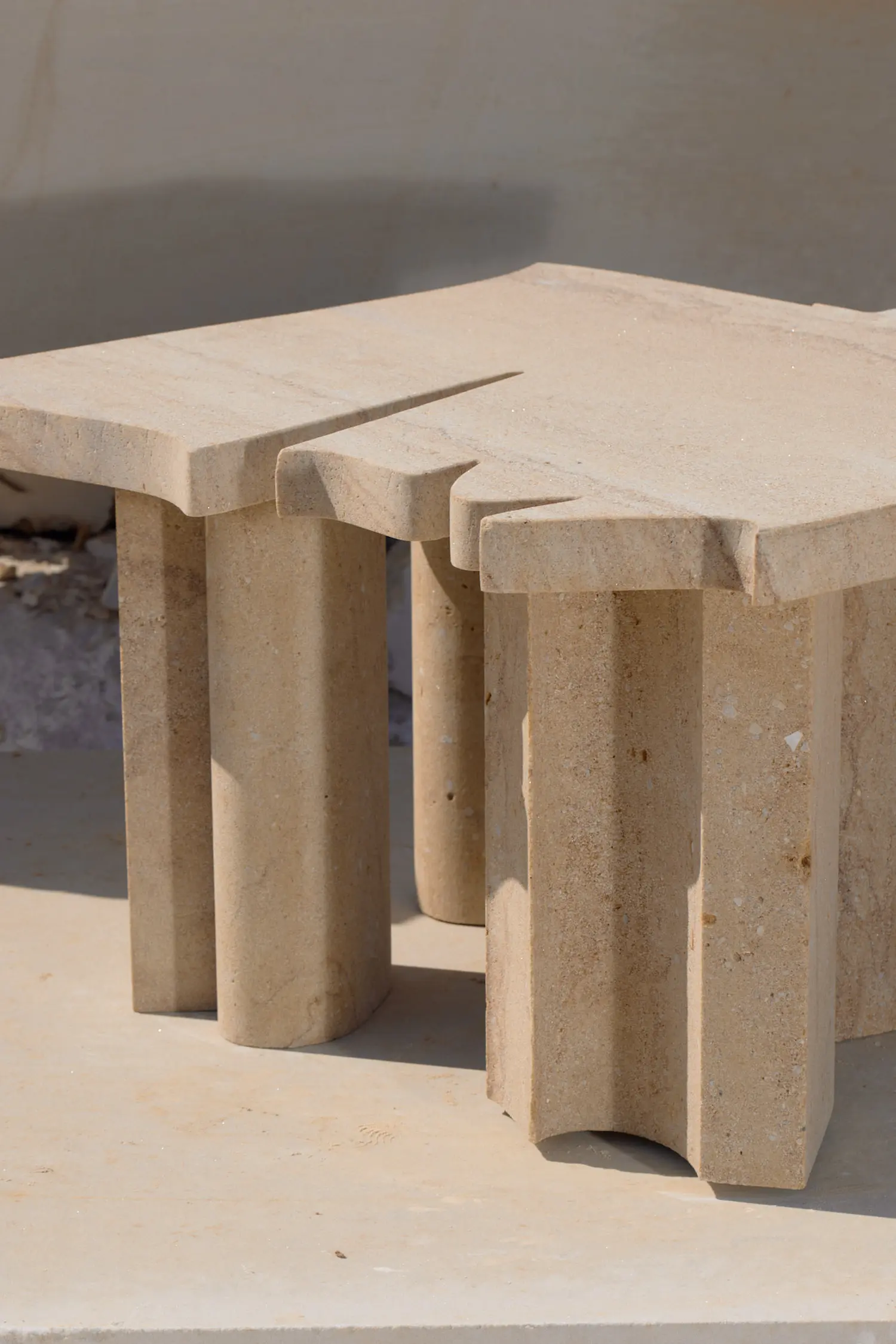 Stone leg elements of Sand Preludium II laid out on sand by Jiri Krejcirik