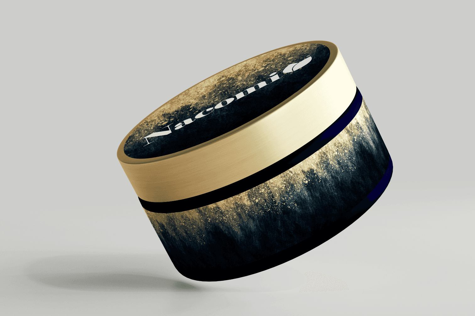 A round, black and gold container with a textured lid, tilted at an angle against a light background.
