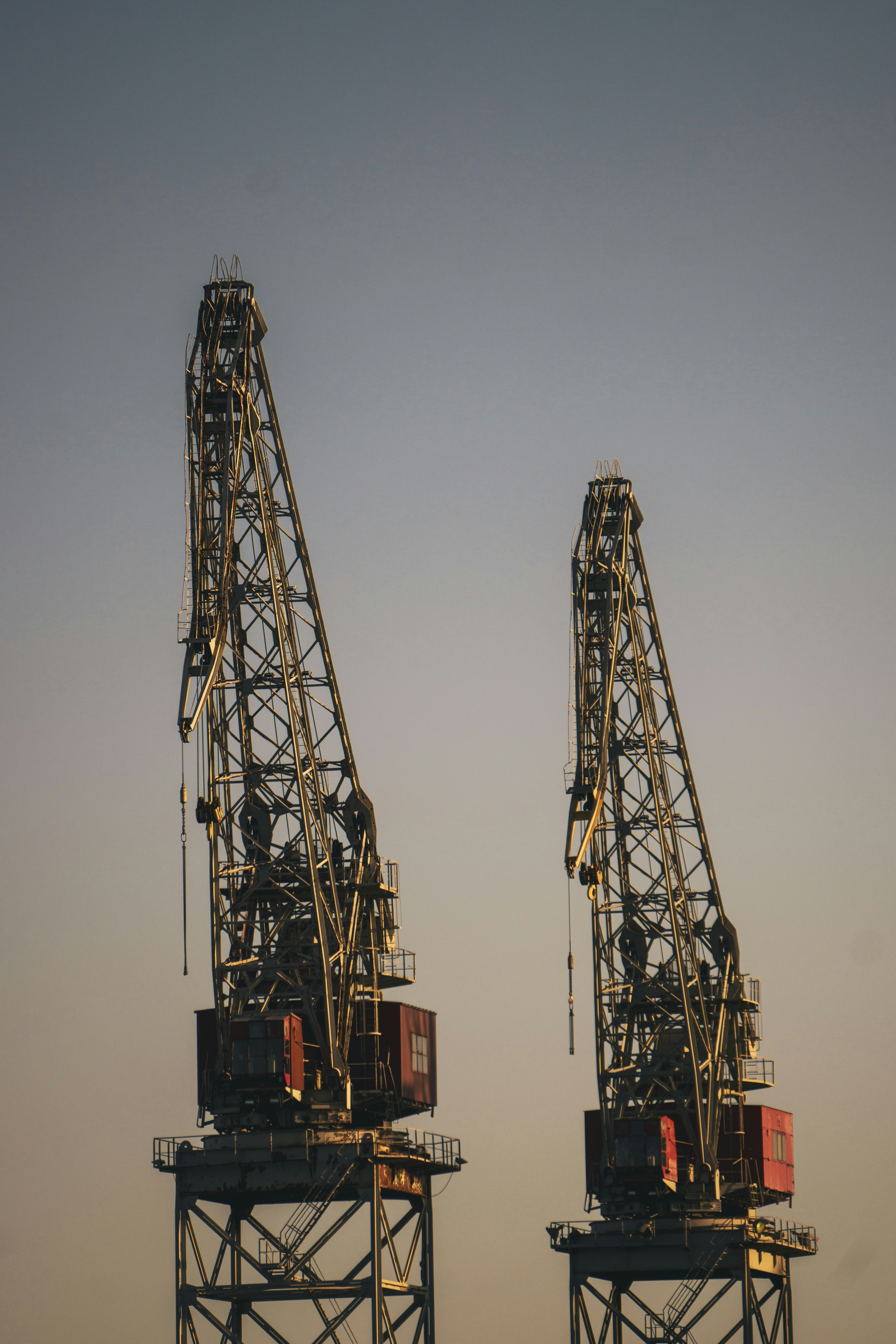 a couple of men standing on top of a boat