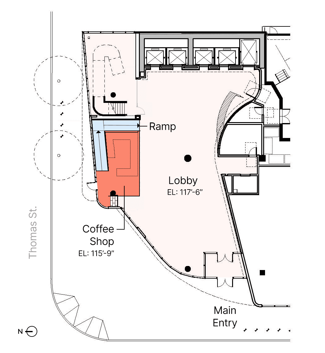 Plan diagram of the initial lobby design, showing a small coffee shop linked to the main lobby by a poorly integrated ramp.