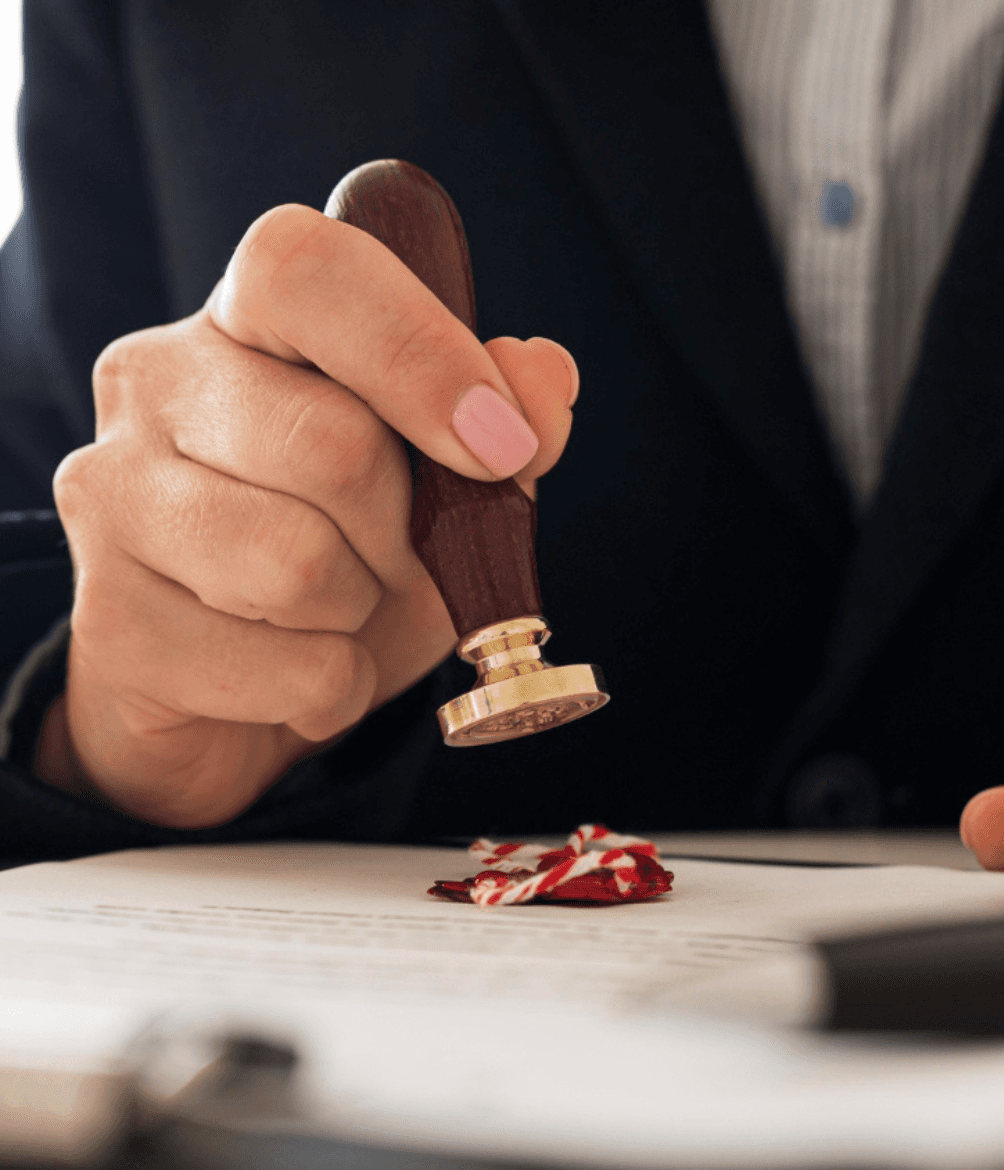 two women talking while looking at laptop computer