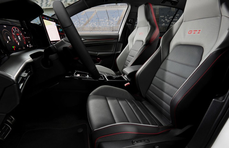 black car steering wheel during daytime