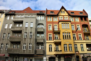 Old Berlin apartment buildings with balconies and gabled roofs