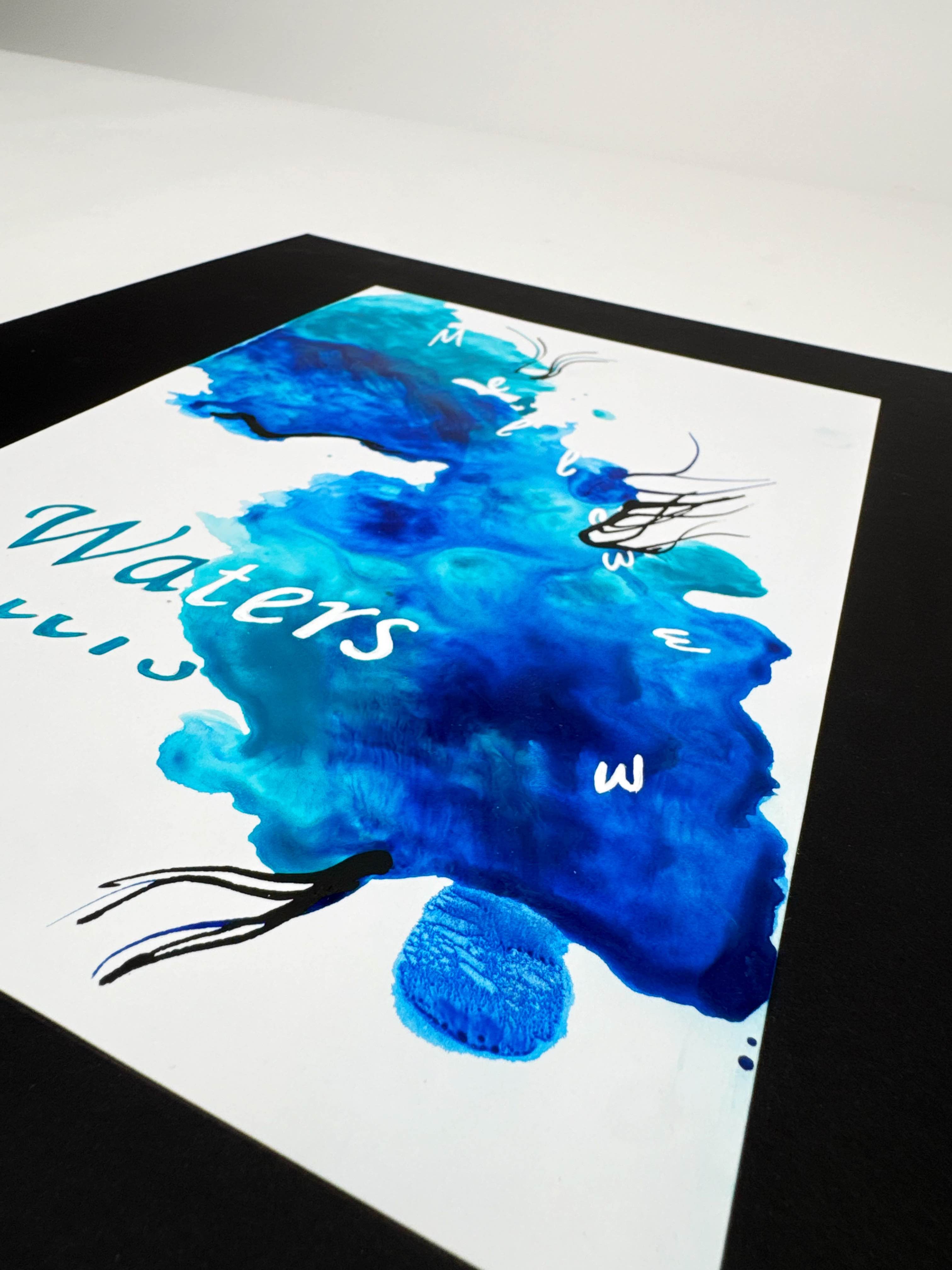 male wearing a black coat with a blue background