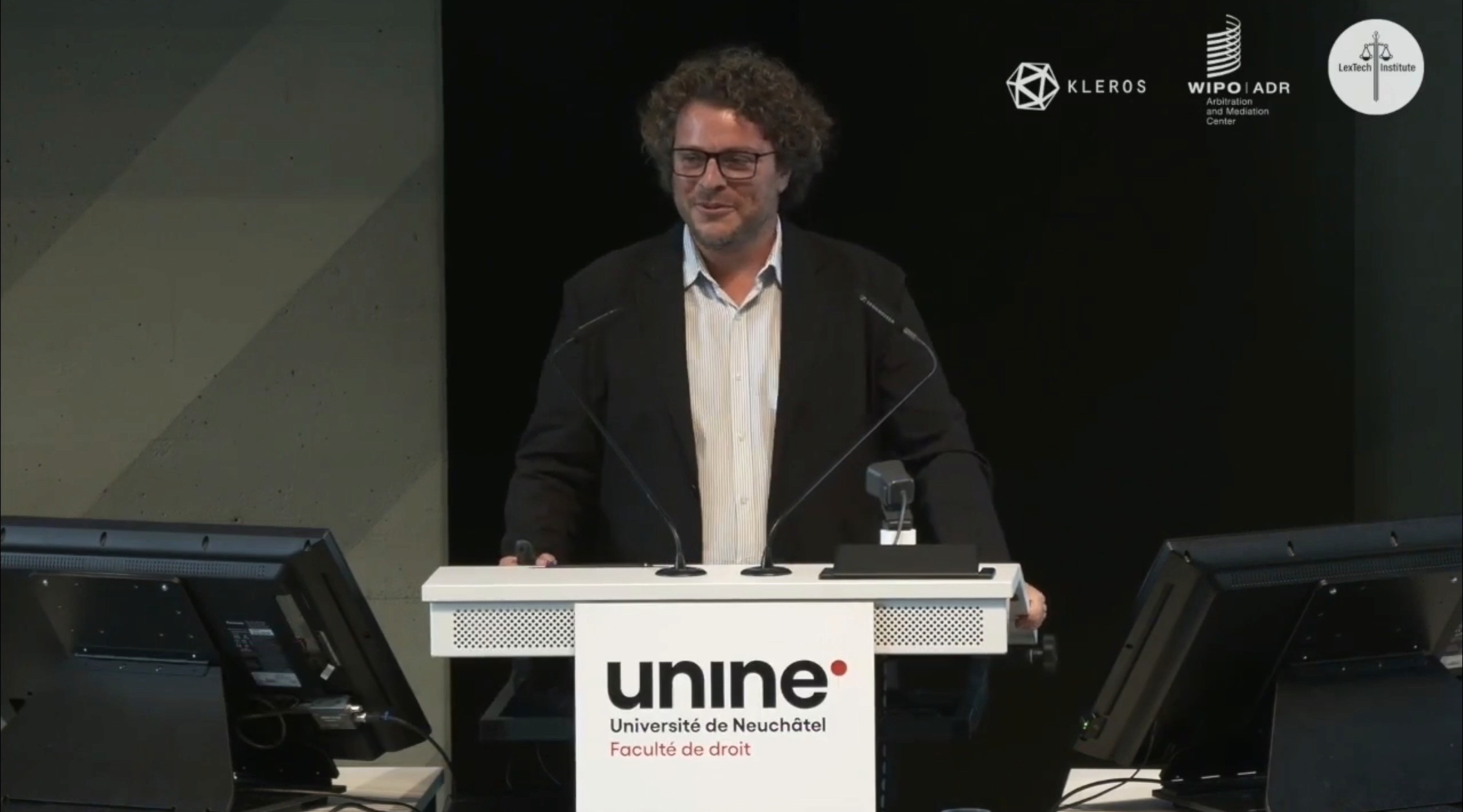 Federico Ast giving a lecture at the University of Neuchâtel about decentralized arbitration in esports.