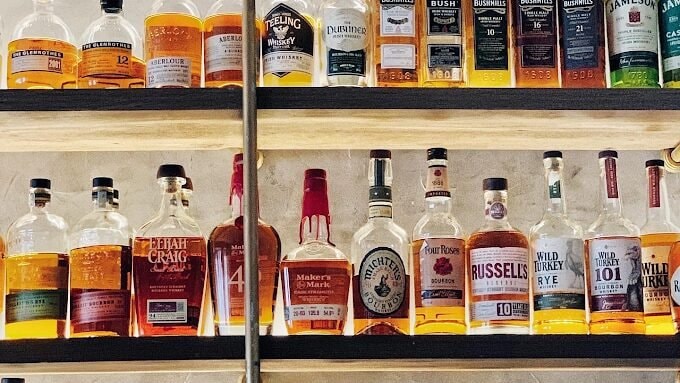 86 PROOF Whiskey Bar Saigon exterior and outdoor patio seating on Xuan Thuy Street in Thao Dien