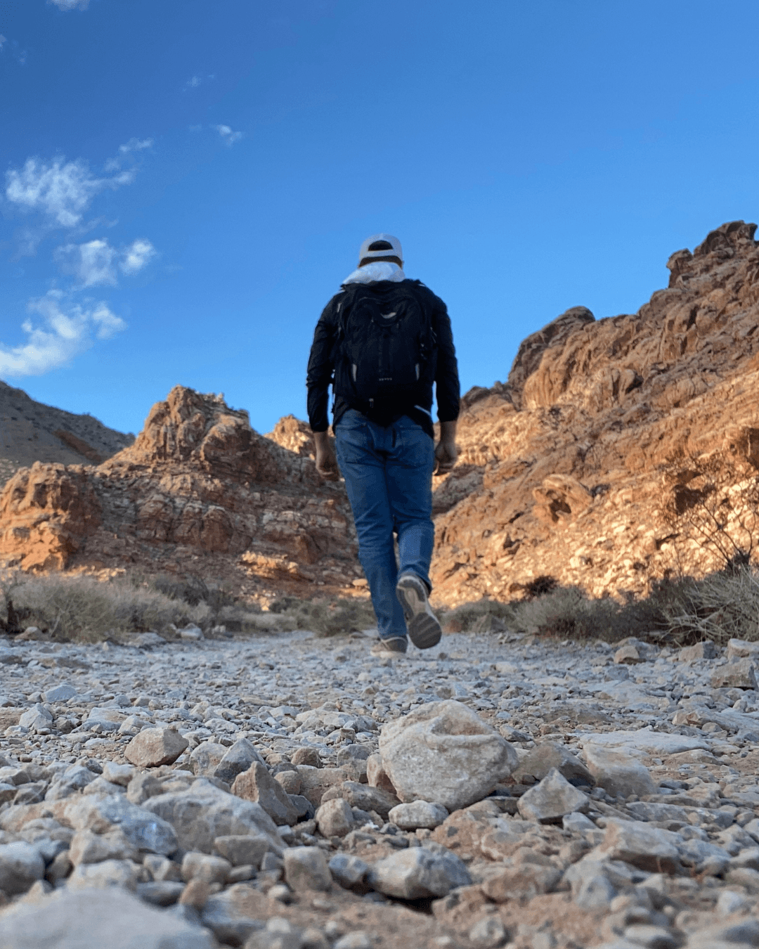 A woman receives a relaxing energy healing in a serene setting with soft lighting.