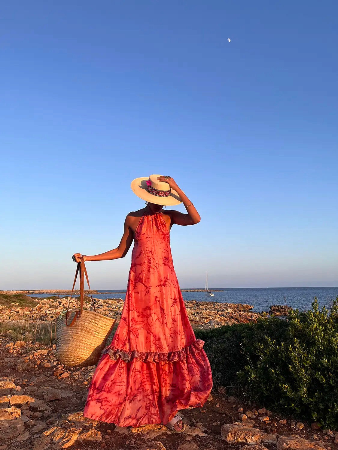 YAMI II is our one-of-a-kind halter neck backless dress, handcrafted using a beautiful printed vintage silk saree.