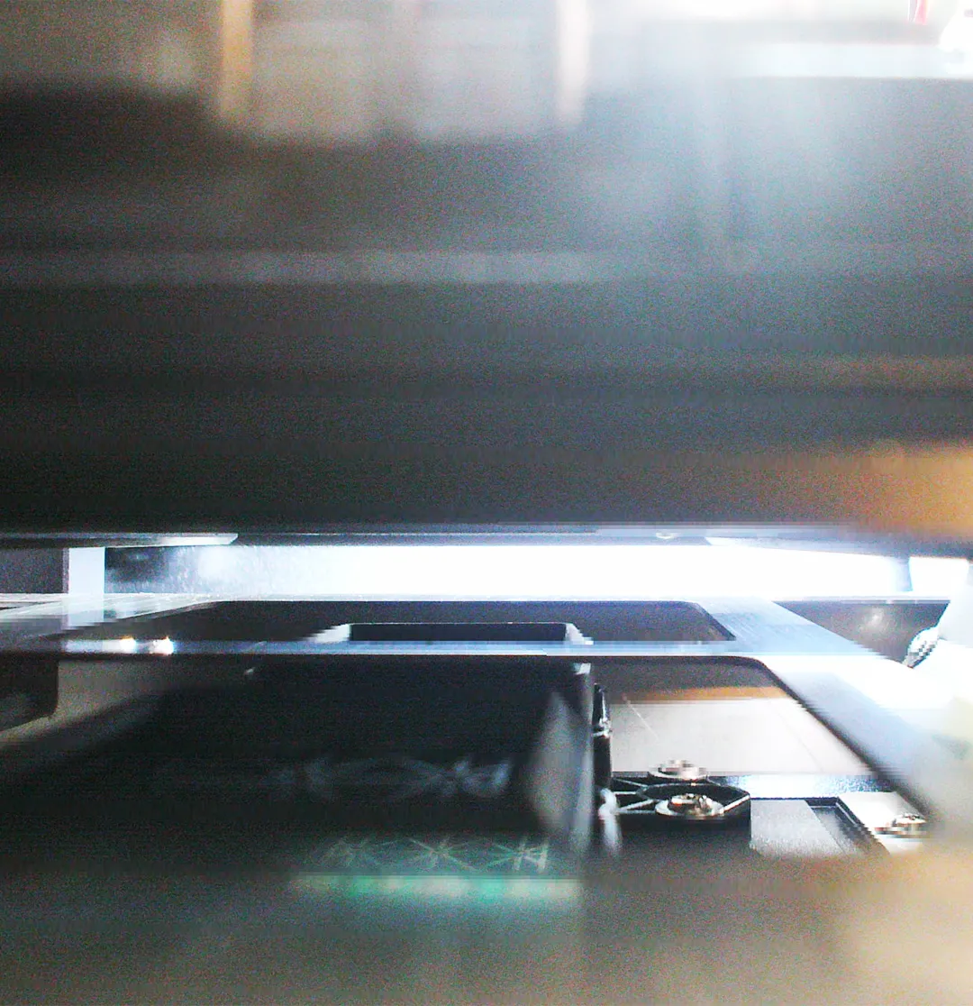 Detailed internal cleaning view 2 of the Manprotek Gravity Pro DTF printer, showing the automated blade and ink management system.