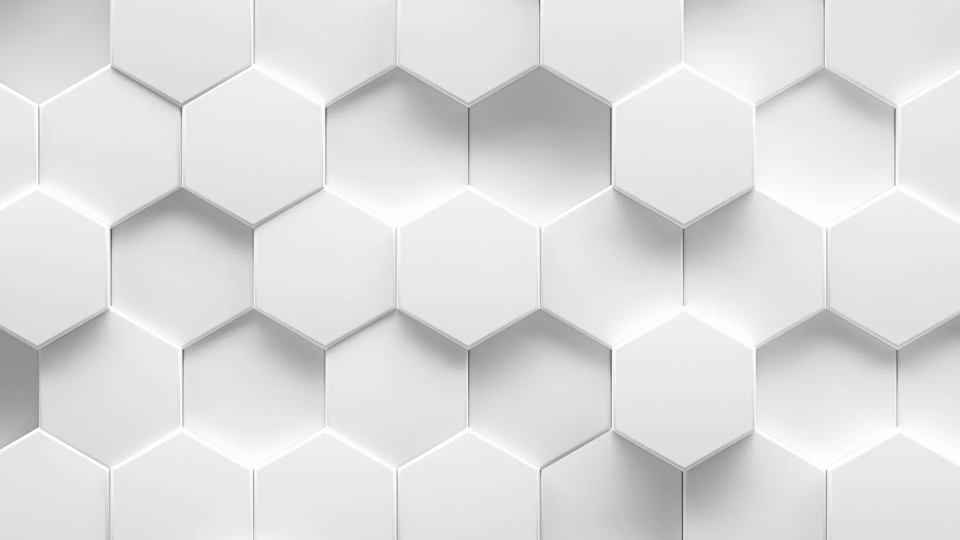 Pristine modern building with a sleek, white facade and geometric lines, standing tall against a clear blue sky, embodying minimalist elegance and contemporary design.