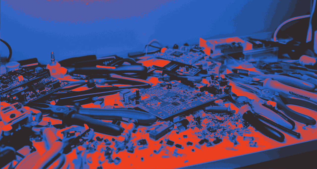 Woman's neck with a diamond choker and an orange calla lily.