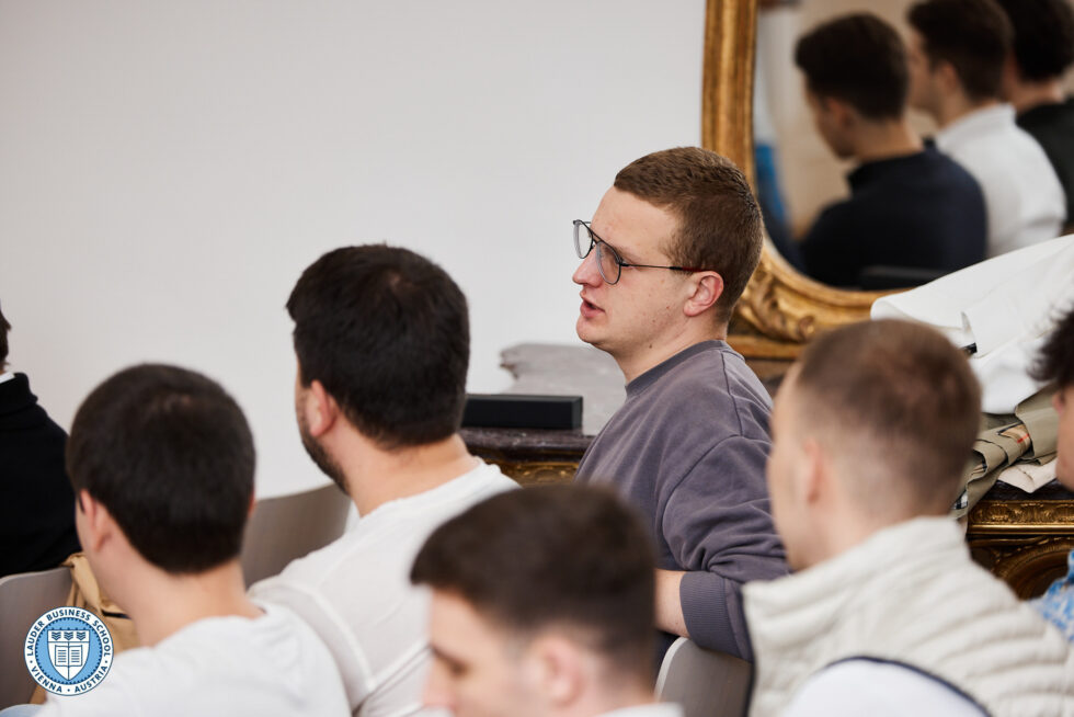 Students listening toMag. Berthold Baurek-Karlic, founder and managing director of Venionaire Capital