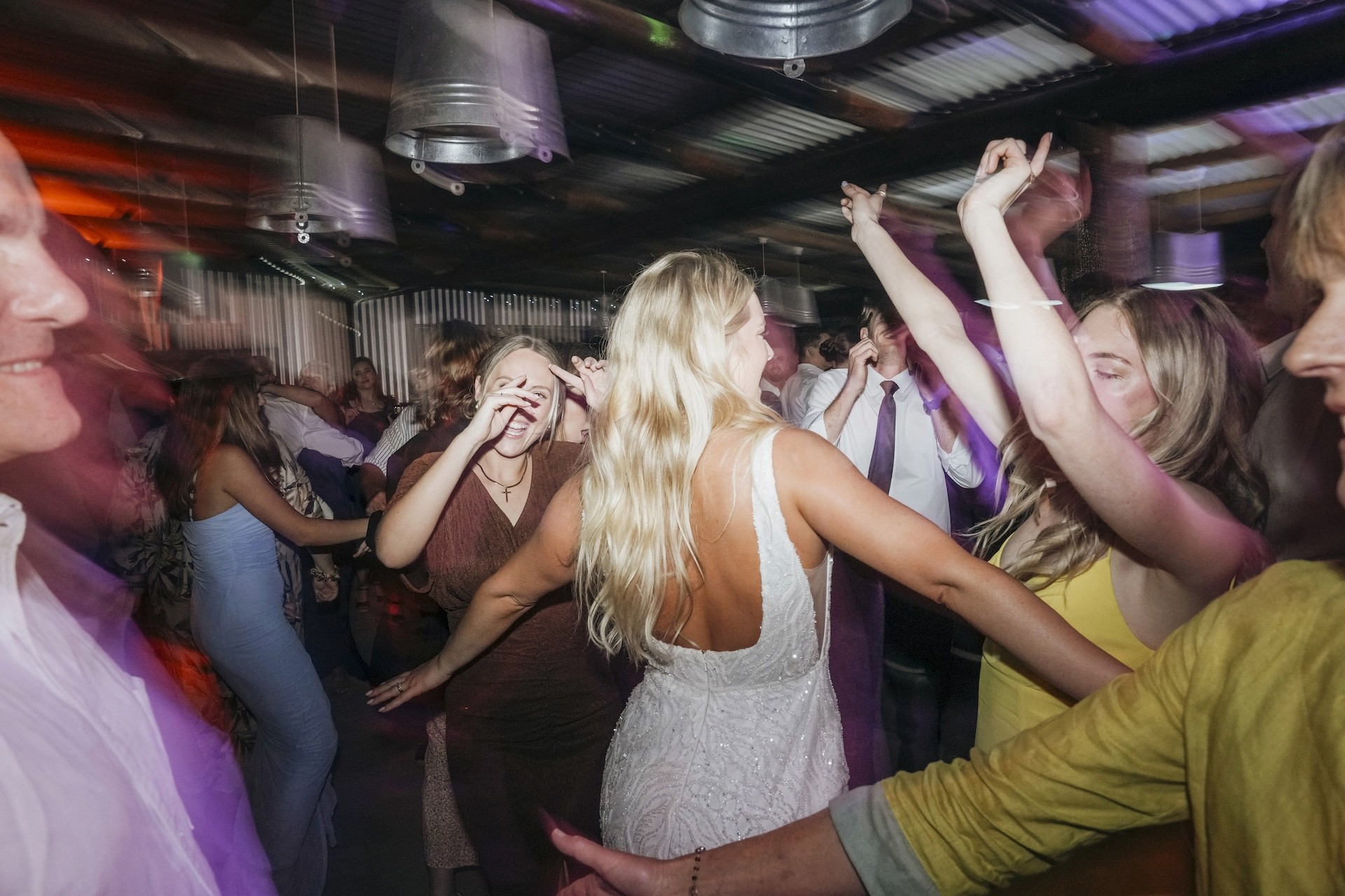 Bride dancing with friends during wedding reception at Oakhurst Wedding Venue in Wilderness, George, Garden Route, Western Cape
