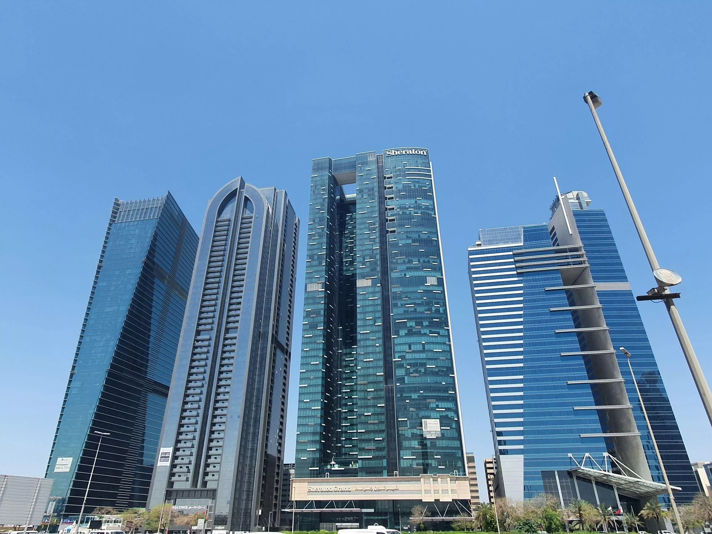 Panoramic view of high-rise skyscrapers in Dubai, including Burj Al Salam, ideal for luxury property investments.