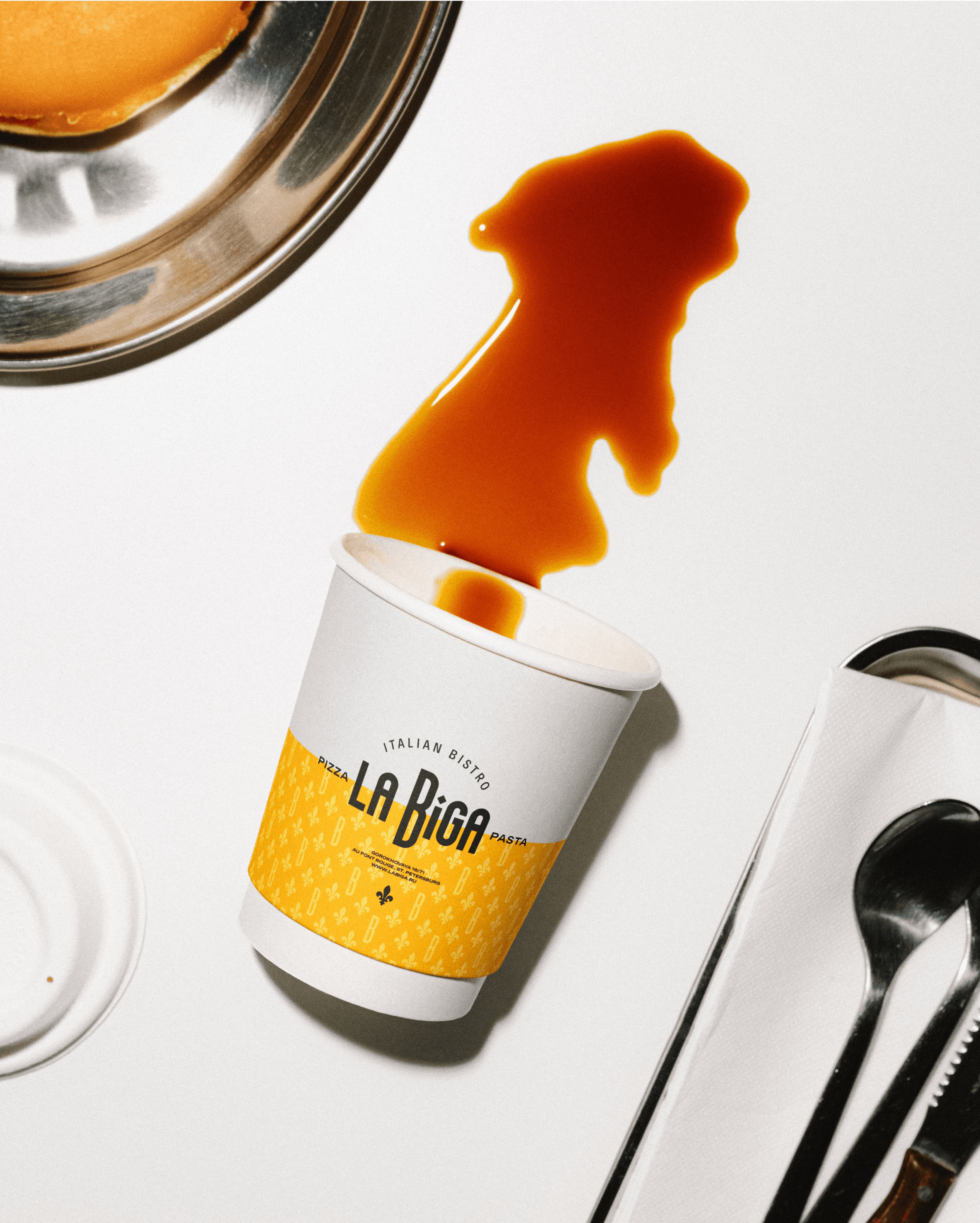 Streetside billboard with flyposters of the Batch.Works brand and illustrations