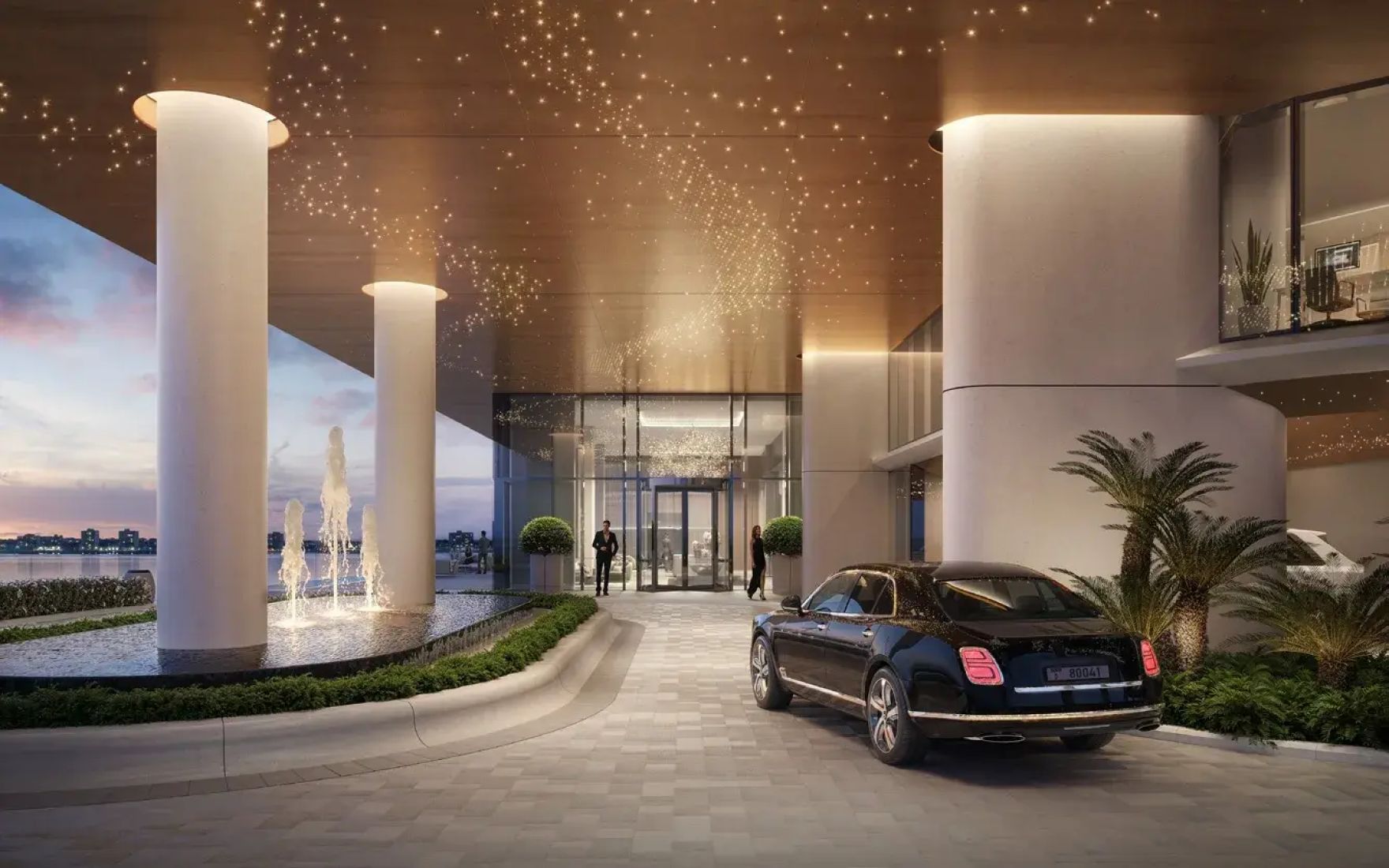 Luxurious Hilton Residences entrance with a black car, grand columns, waterfalls, and a ceiling with sparkling star-like lights.