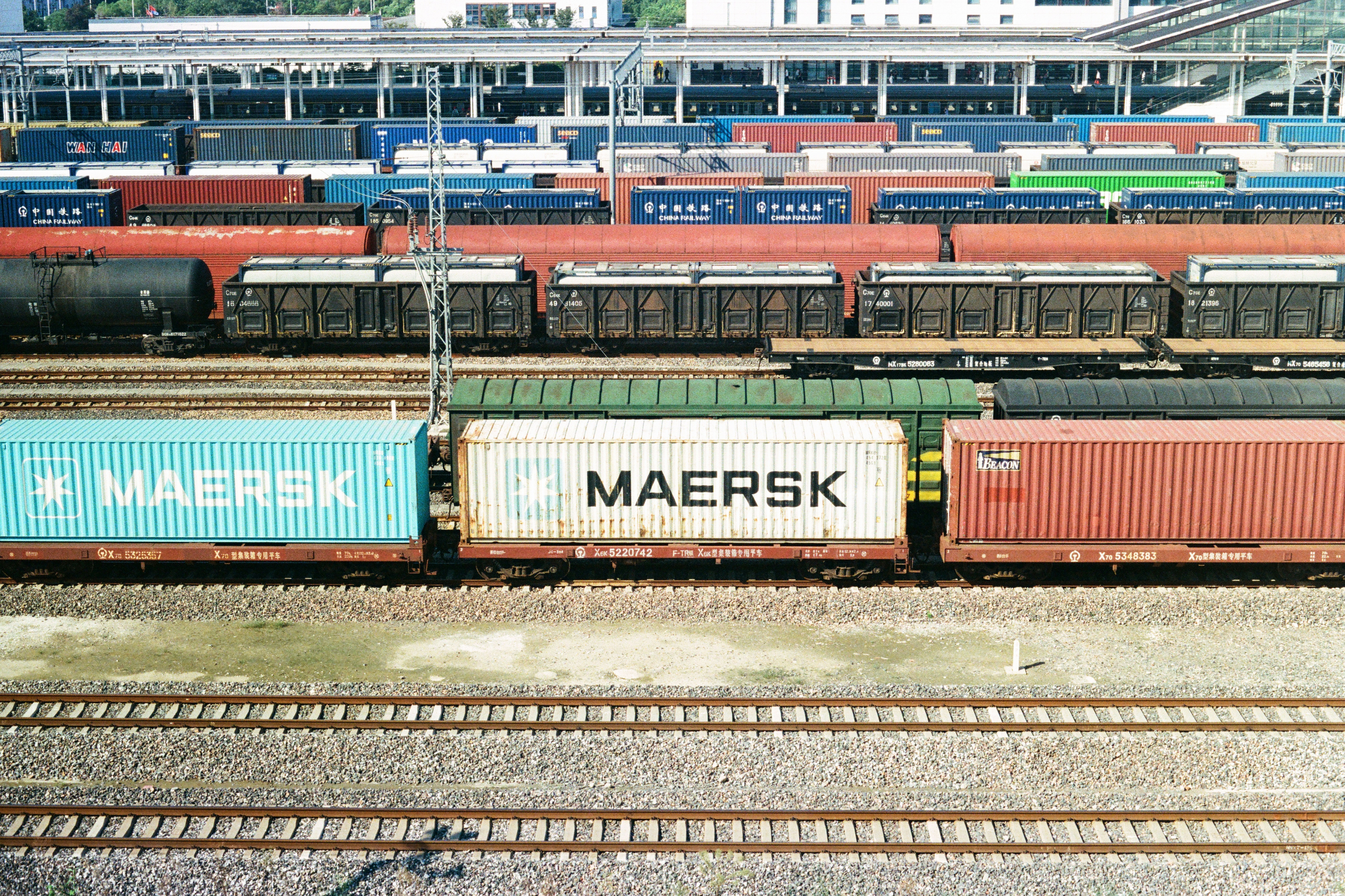 Rows of freight trains with shipping containers