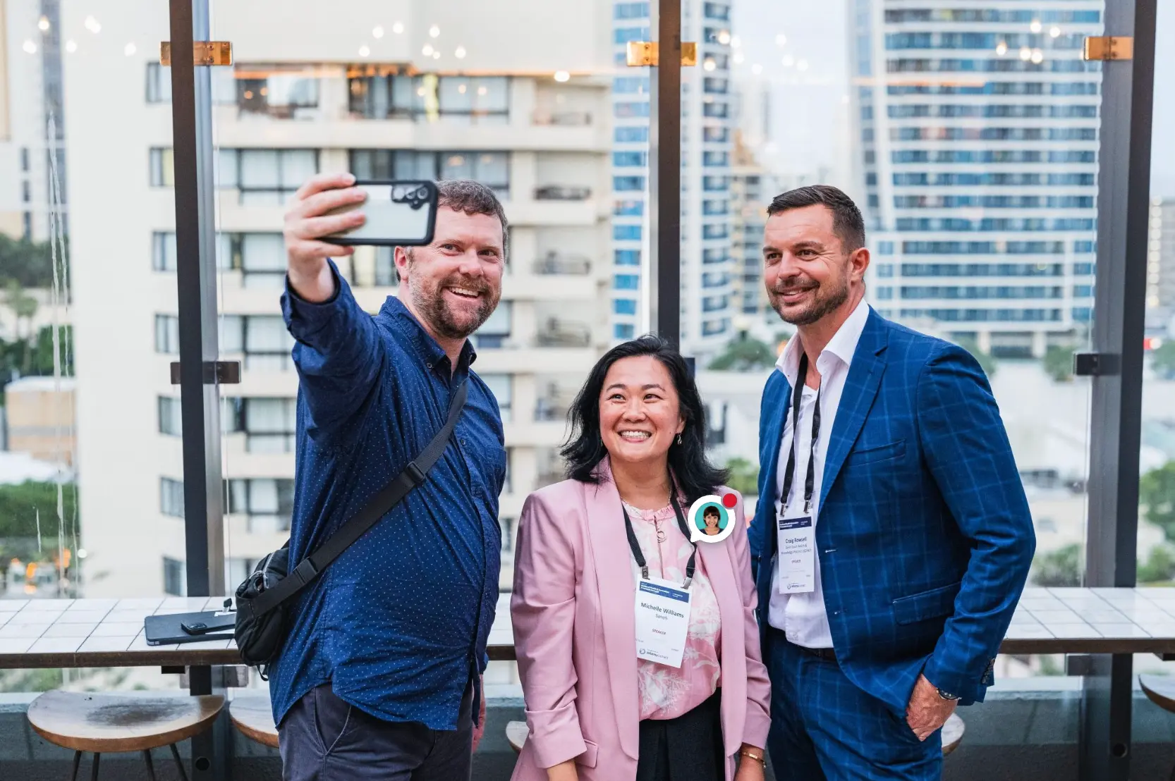 Three attendees including a Sanofi speaker taking a group selfie at the 2024 National Health and Innovation Precinct Summit, Gold Coast